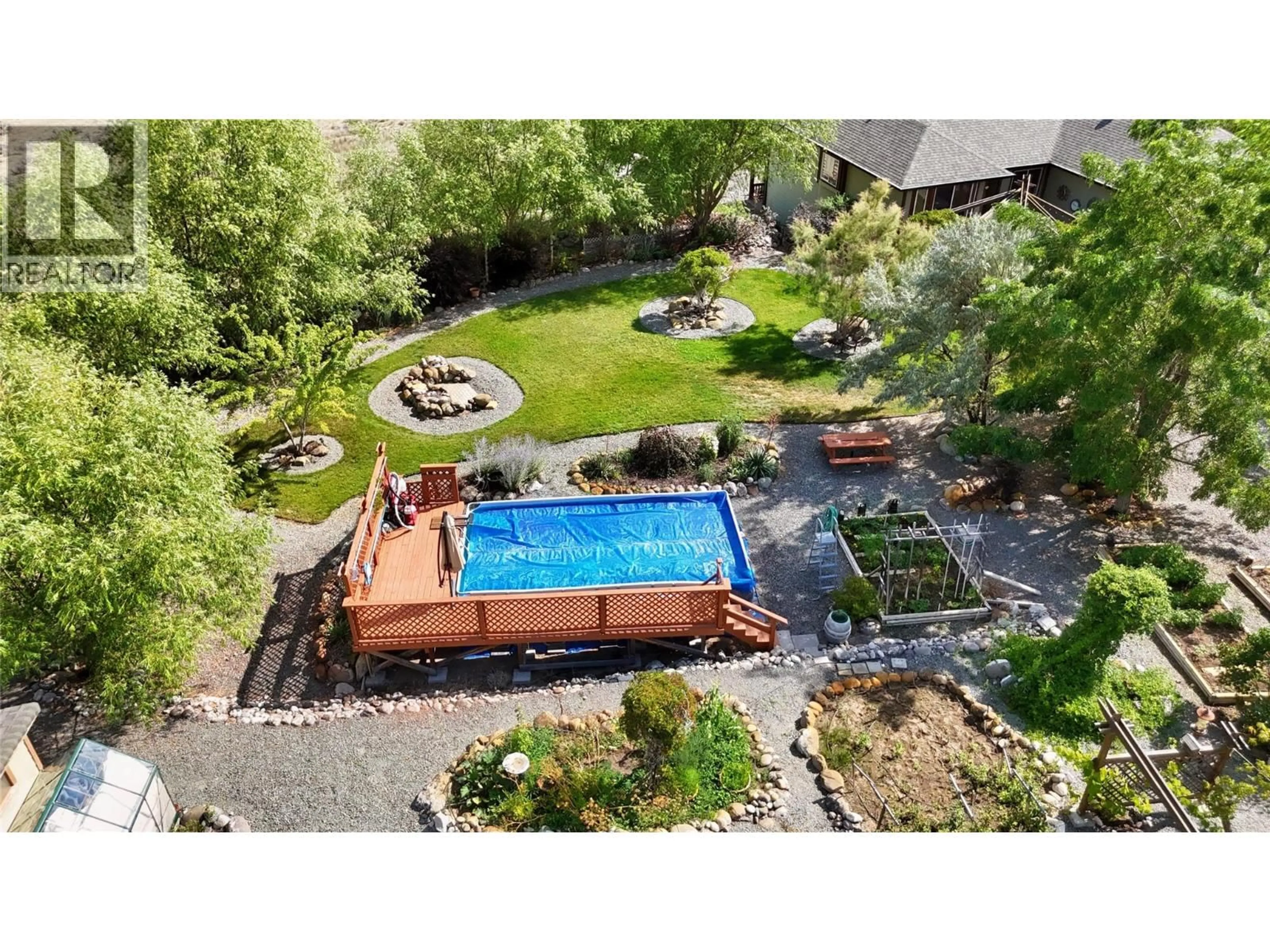 A pic from outside/outdoor area/front of a property/back of a property/a pic from drone, water/lake/river/ocean view for 6341 THOMPSON RIVER DRIVE WEST, Kamloops British Columbia V0K2P0