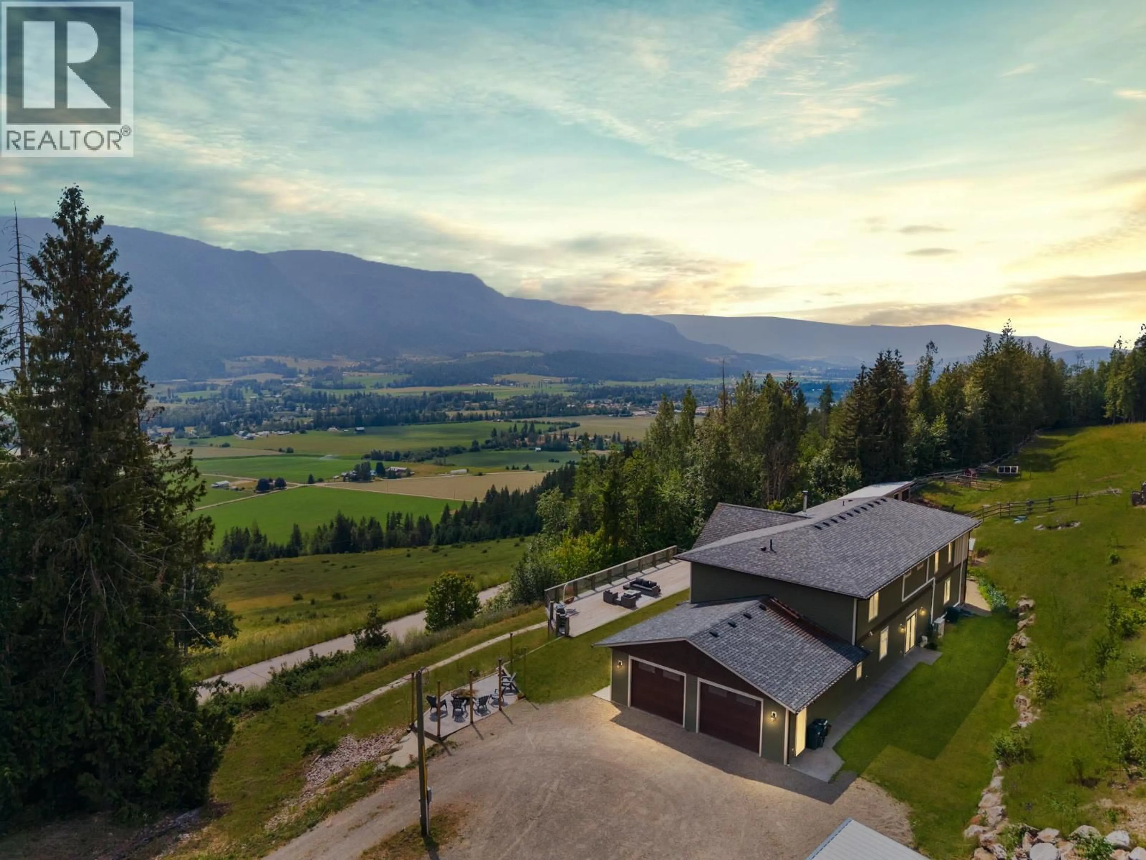 A pic from outside/outdoor area/front of a property/back of a property/a pic from drone, mountain view for 240 GRANDVIEW BENCH ROAD, Grindrod British Columbia V1E2Y4