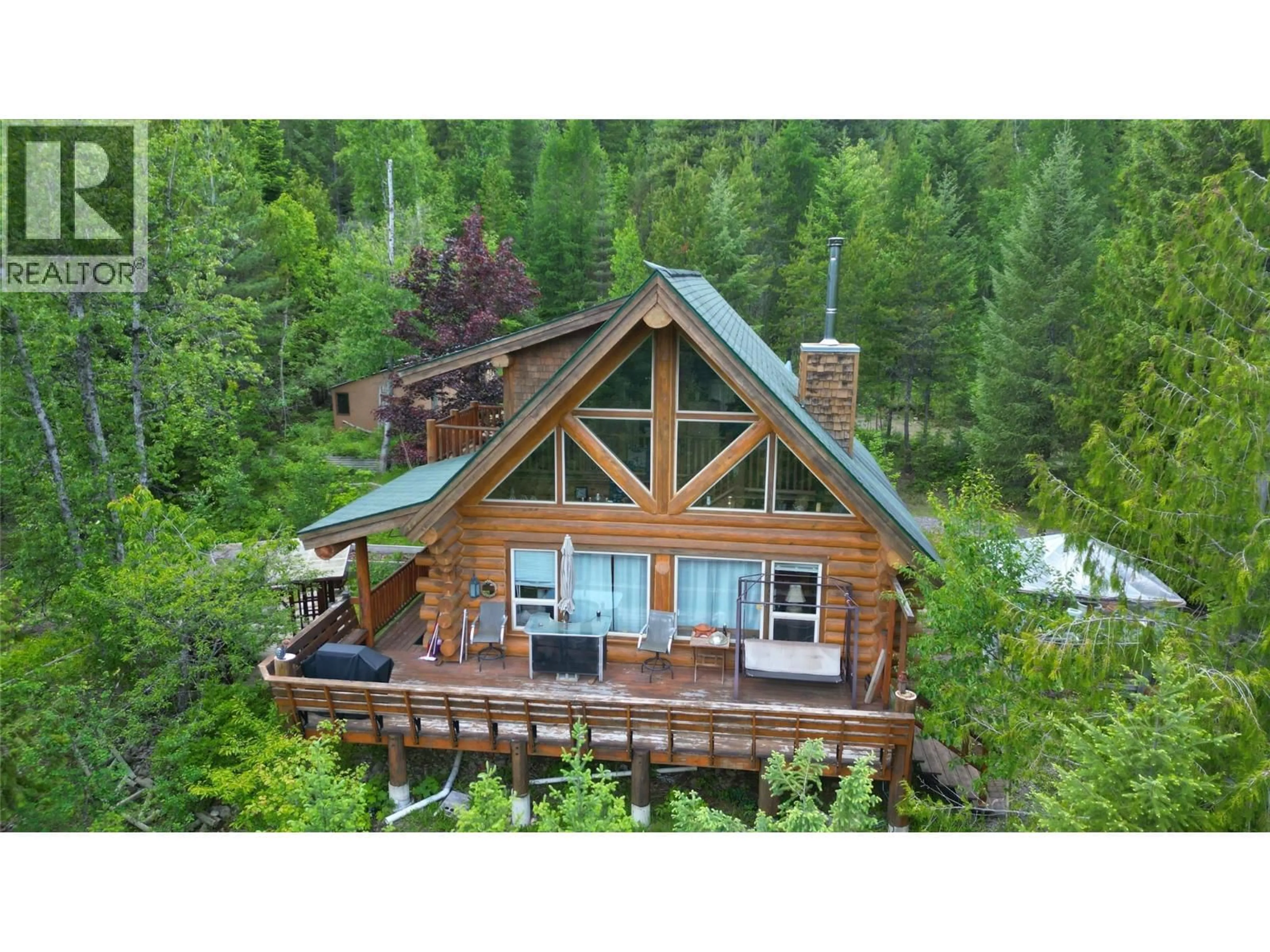 A pic from outside/outdoor area/front of a property/back of a property/a pic from drone, water/lake/river/ocean view for 2201 3/95 HIGHWAY, Yahk British Columbia V0B2P0