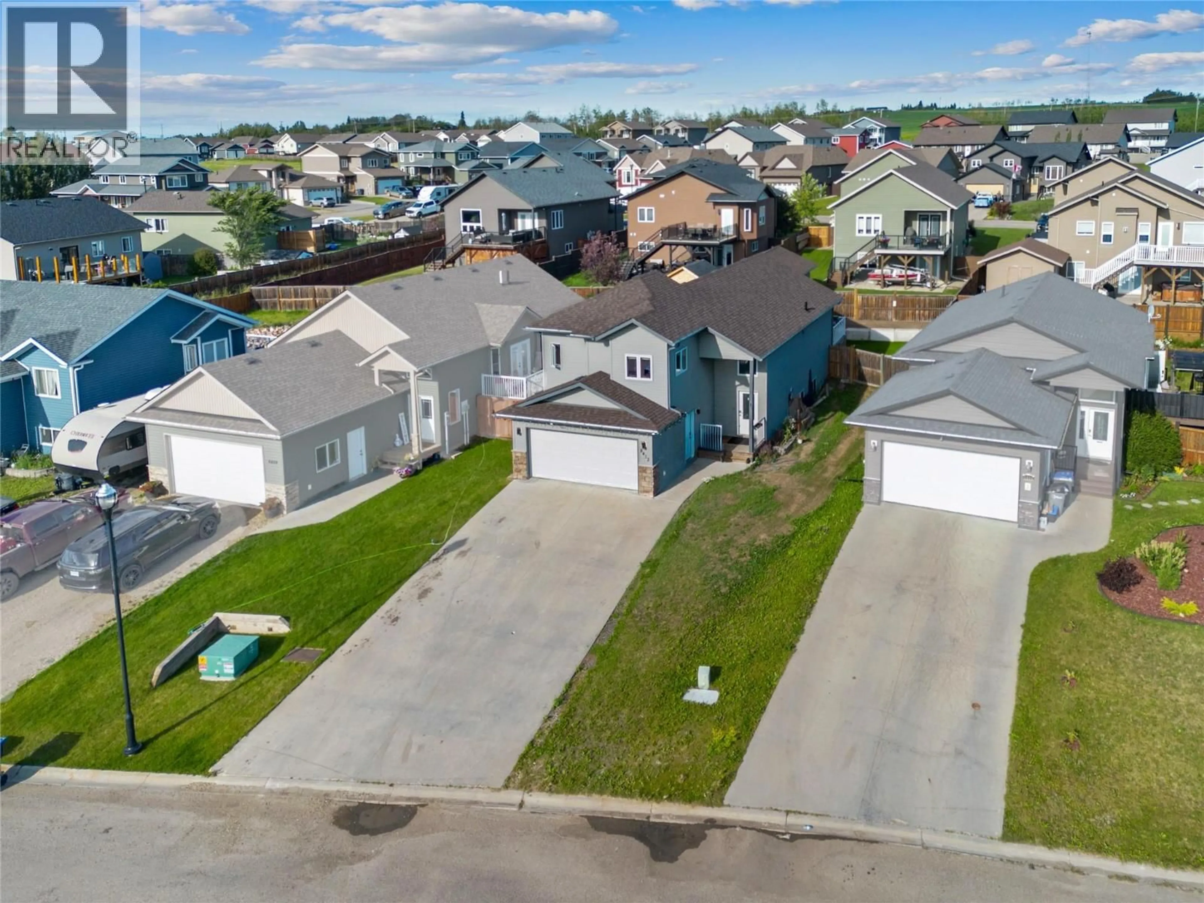A pic from outside/outdoor area/front of a property/back of a property/a pic from drone, street for 8412 18A STREET, Dawson Creek British Columbia V1G0E2