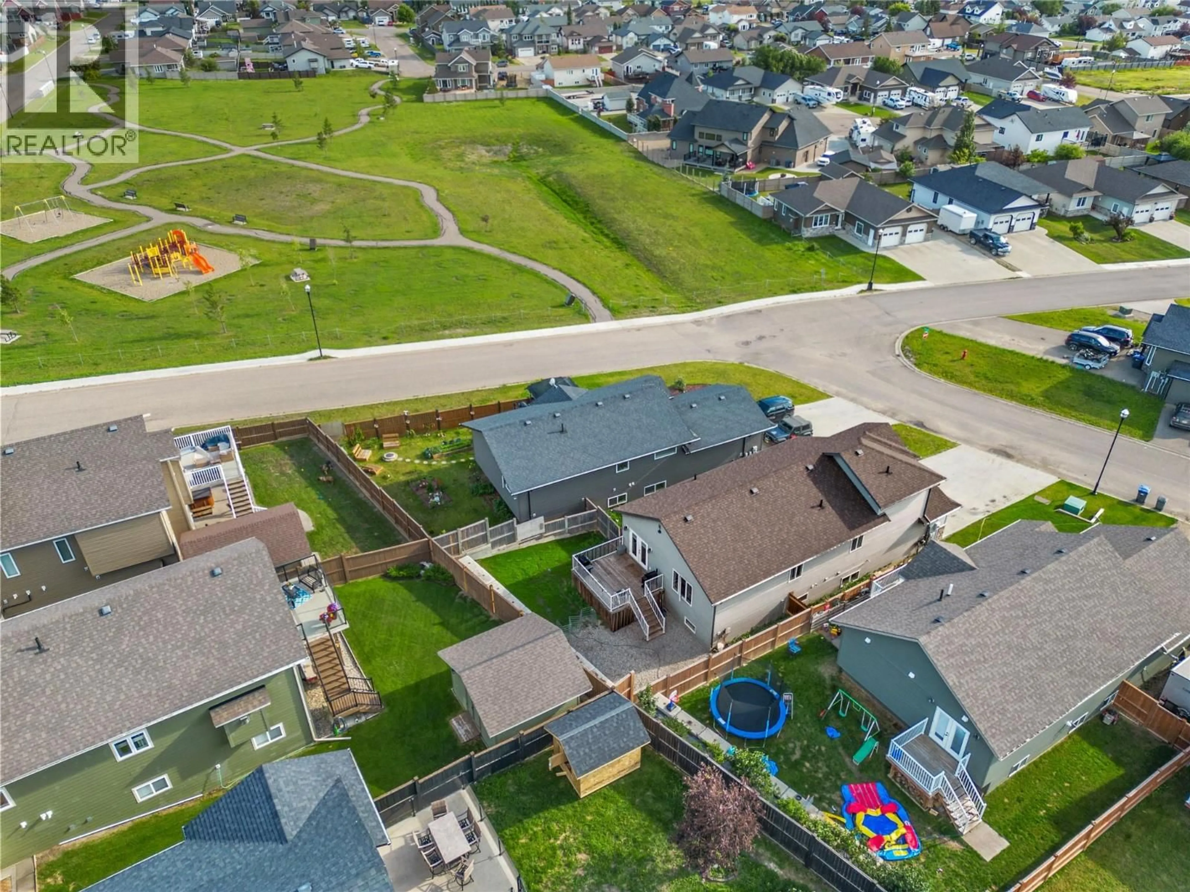 A pic from outside/outdoor area/front of a property/back of a property/a pic from drone, street for 8412 18A STREET, Dawson Creek British Columbia V1G0E2