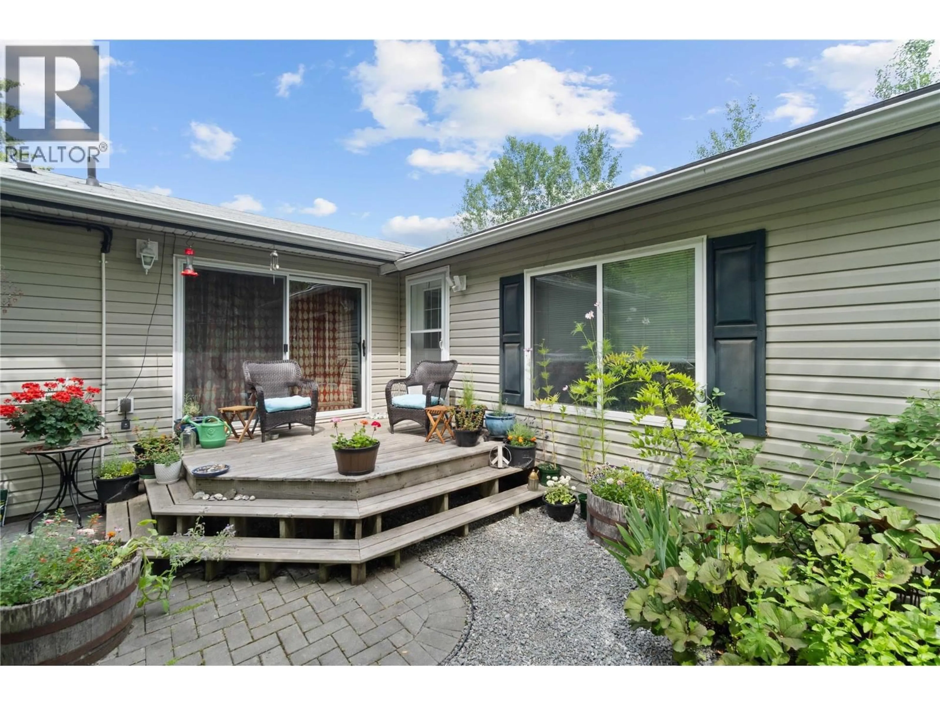 Home with vinyl exterior material, street for 4421 73 AVENUE NORTHEAST, Salmon Arm British Columbia V0E1K0
