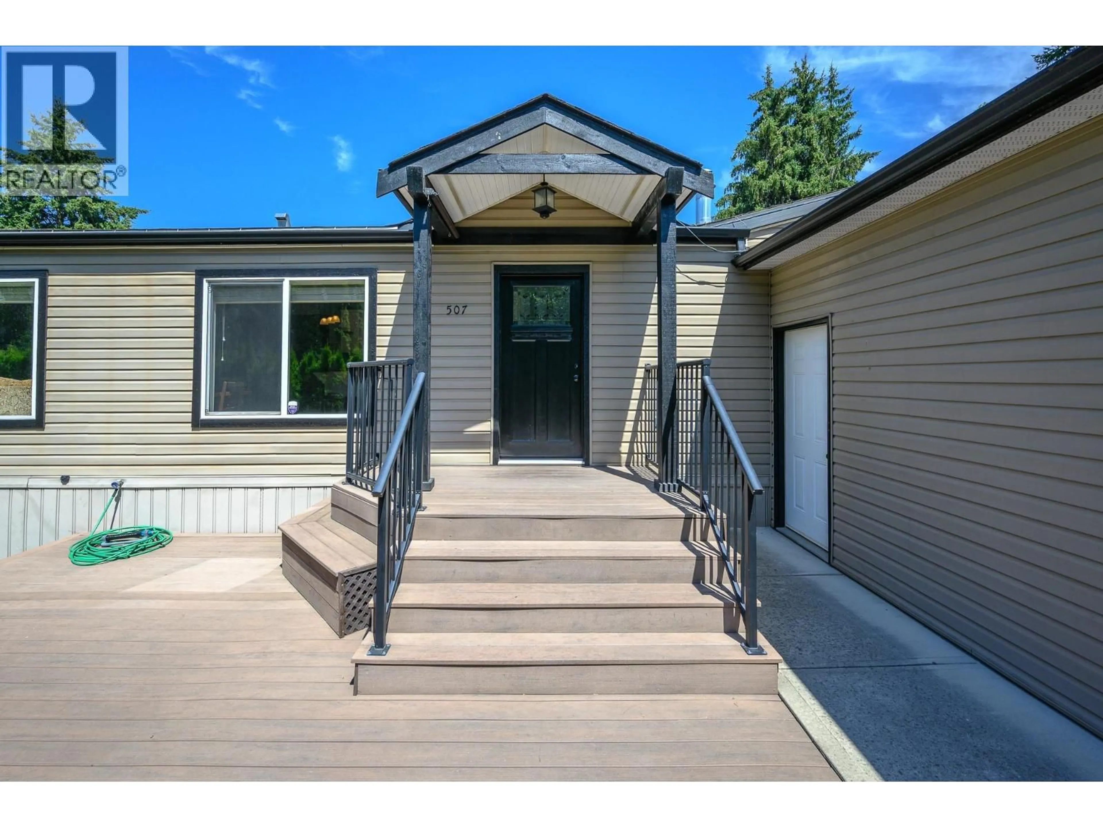 Home with vinyl exterior material, street for 507 - 4701 PLEASANT VALLEY ROAD, Vernon British Columbia V1T4M7