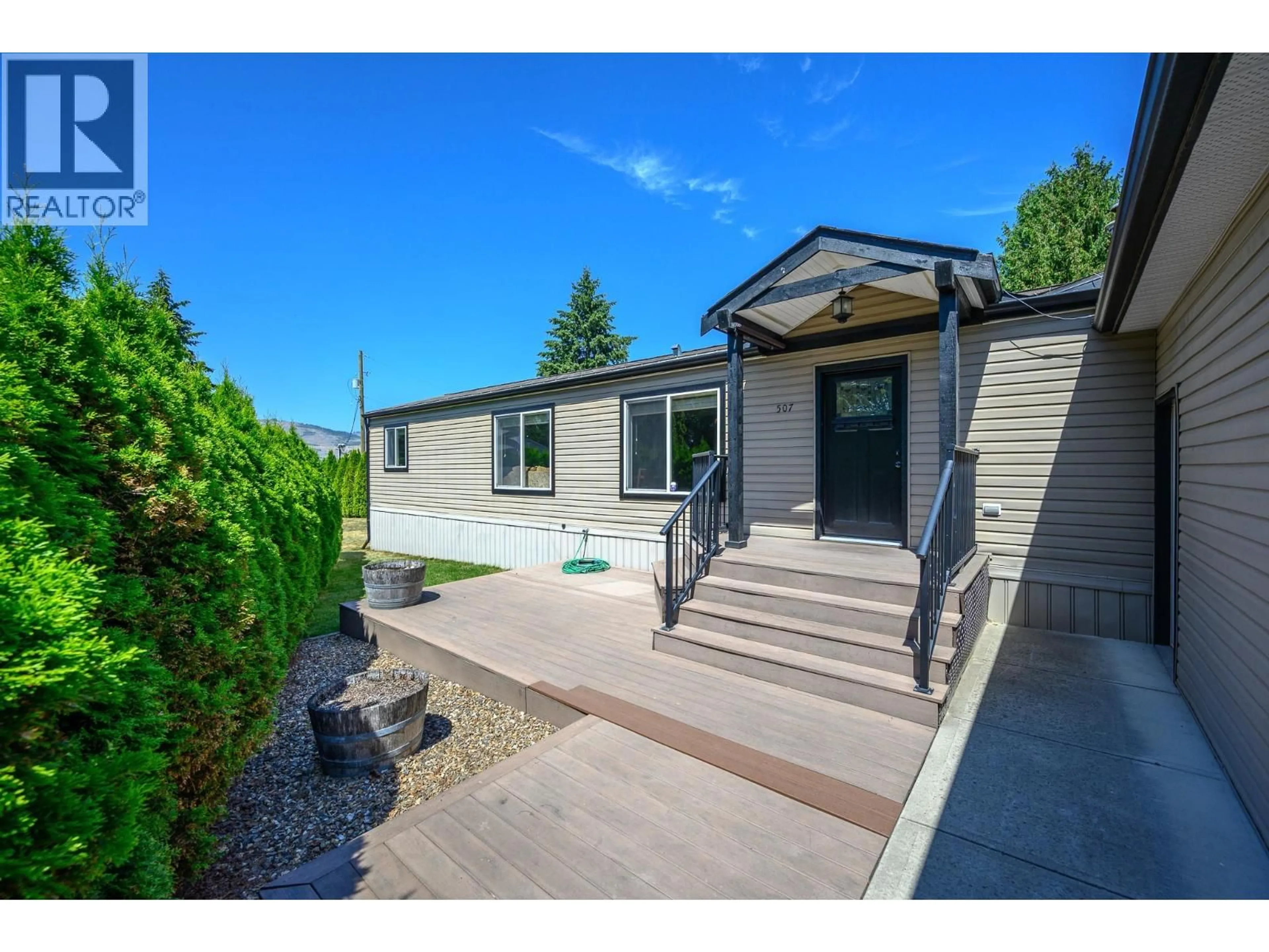 Home with vinyl exterior material, street for 507 - 4701 PLEASANT VALLEY ROAD, Vernon British Columbia V1T4M7