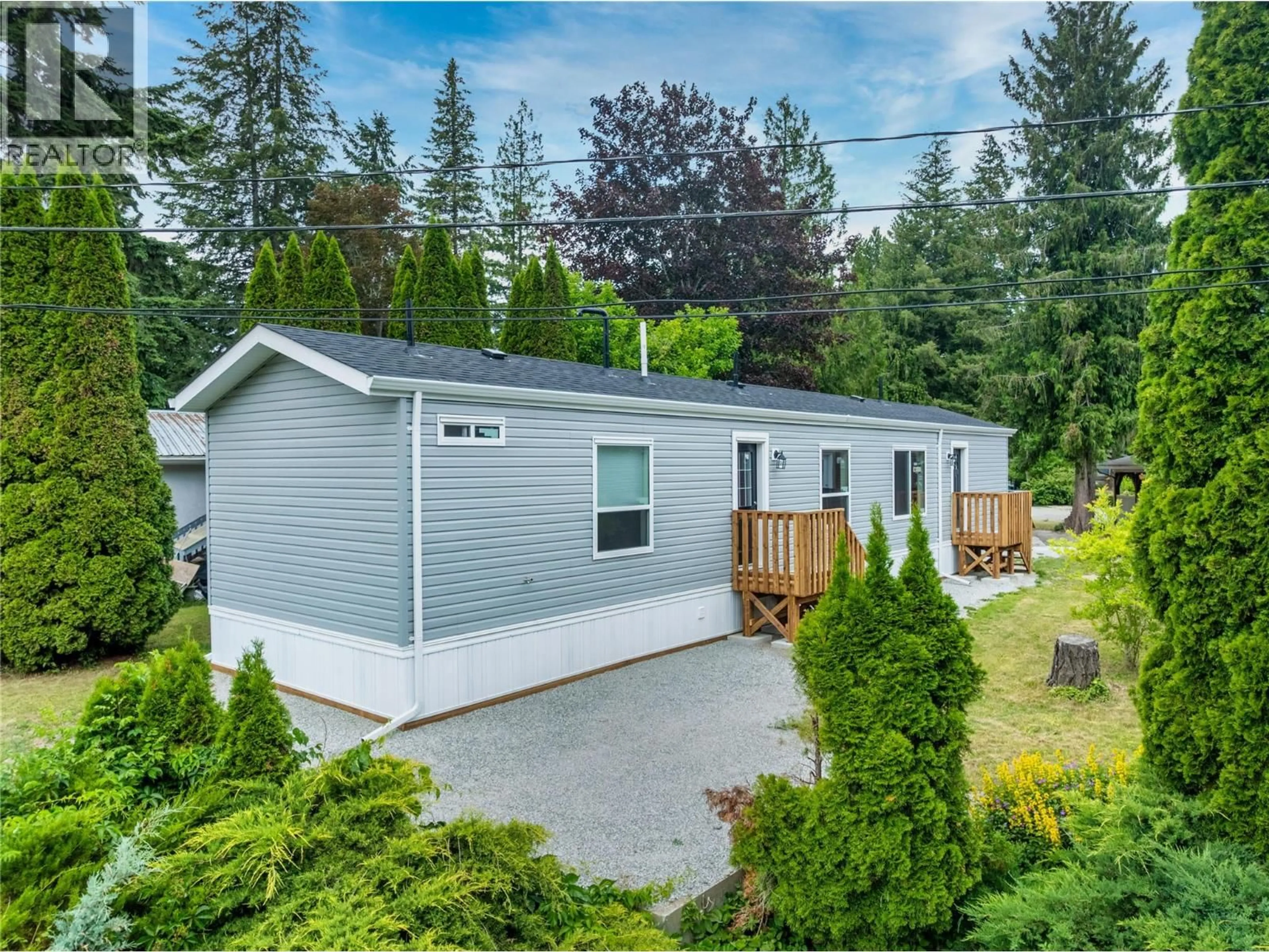 Home with vinyl exterior material, street for 13 - 5161 63 AVENUE NORTHEAST, Salmon Arm British Columbia V0E1K0