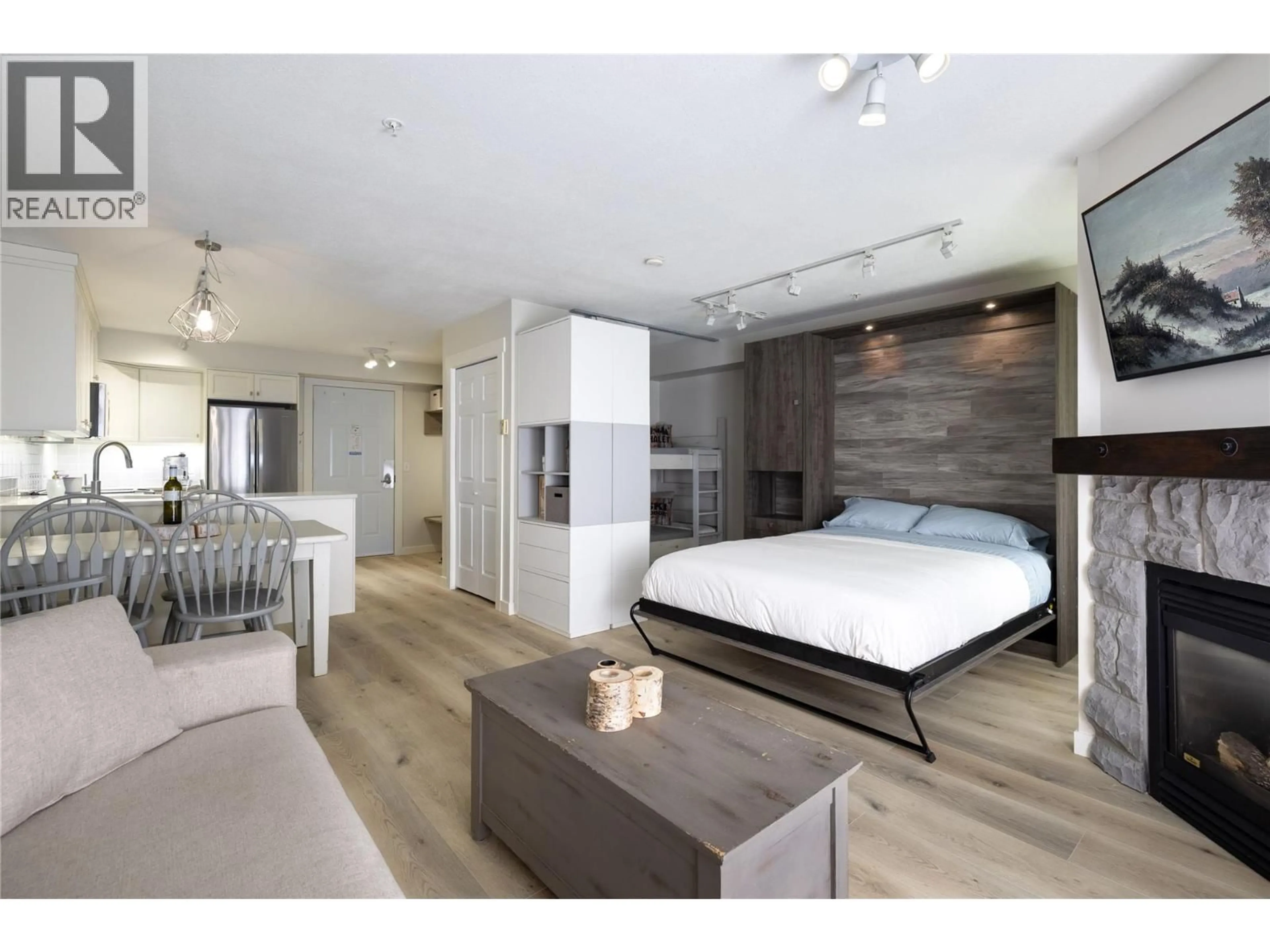 Bedroom with bed, wood/laminate floor for 253 - 155 SILVER LODE LANE, Silver Star British Columbia V1B3M1
