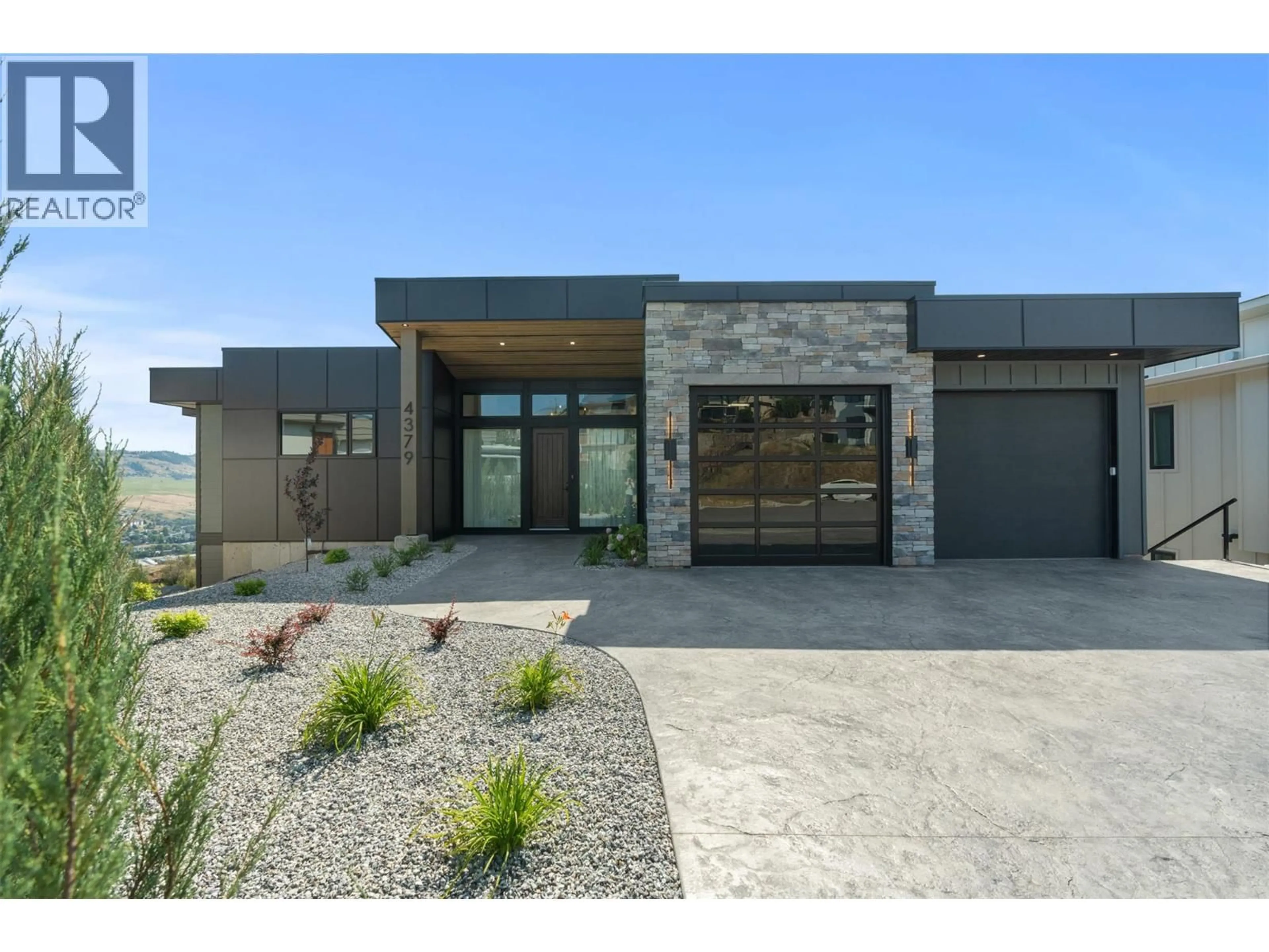 Home with brick exterior material, street for 4379 PAINTED TURTLE DRIVE, Vernon British Columbia V1T9W4
