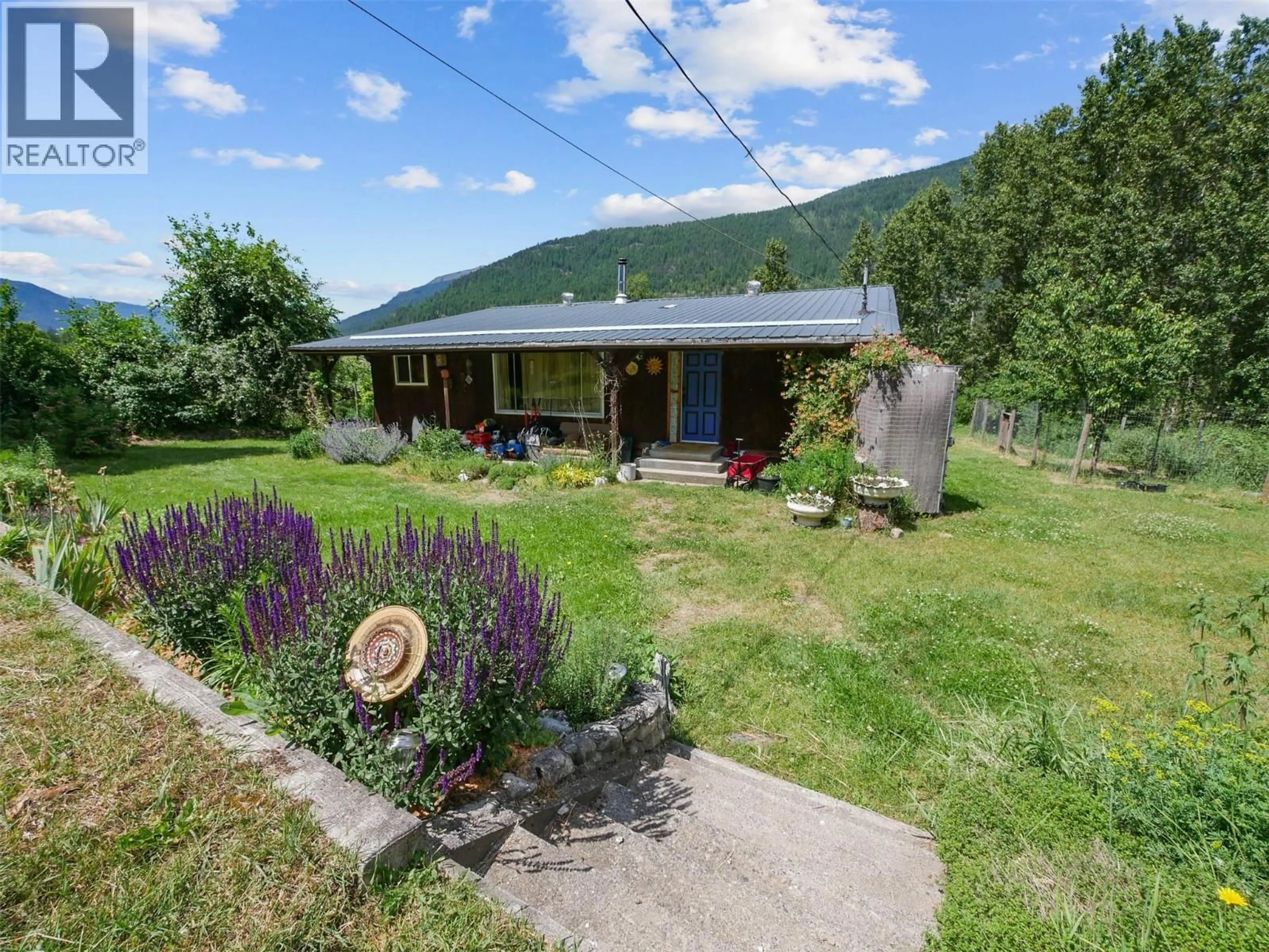 A pic from outside/outdoor area/front of a property/back of a property/a pic from drone, mountain view for 6123 TELFORD ROAD, Winlaw British Columbia V0G2J0