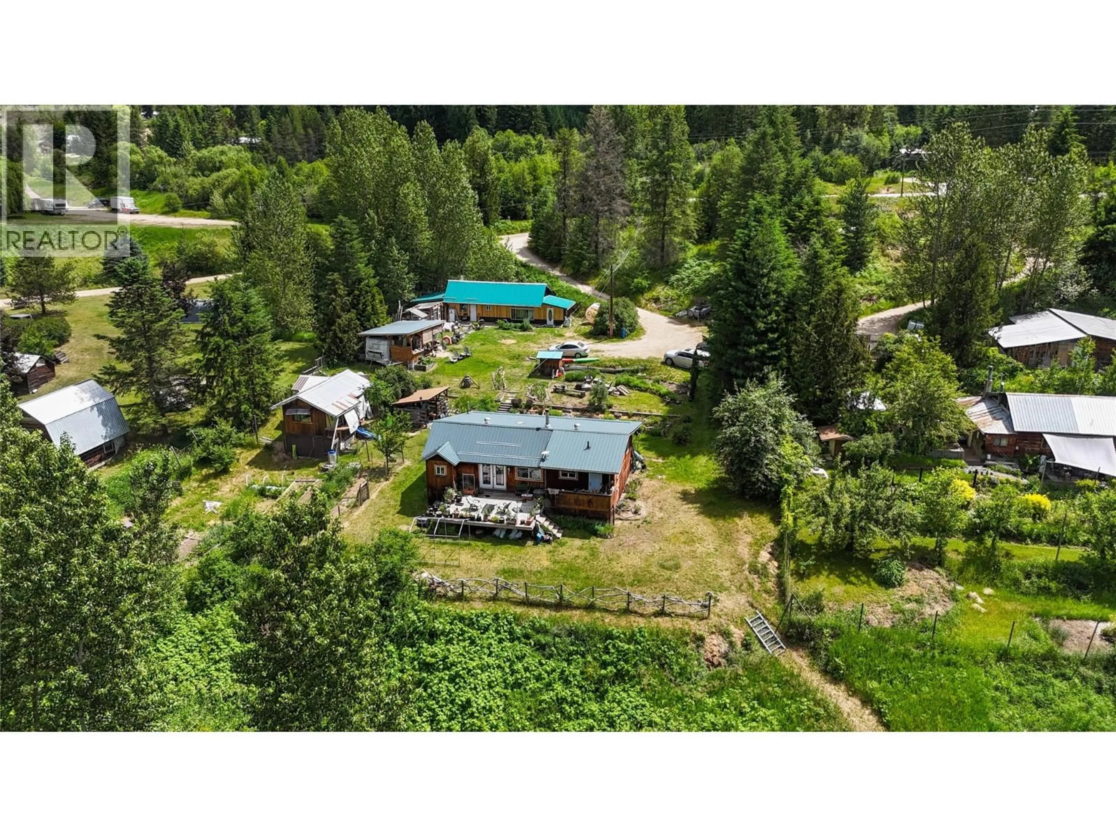 A pic from outside/outdoor area/front of a property/back of a property/a pic from drone, forest/trees view for 6123 TELFORD ROAD, Winlaw British Columbia V0G2J0