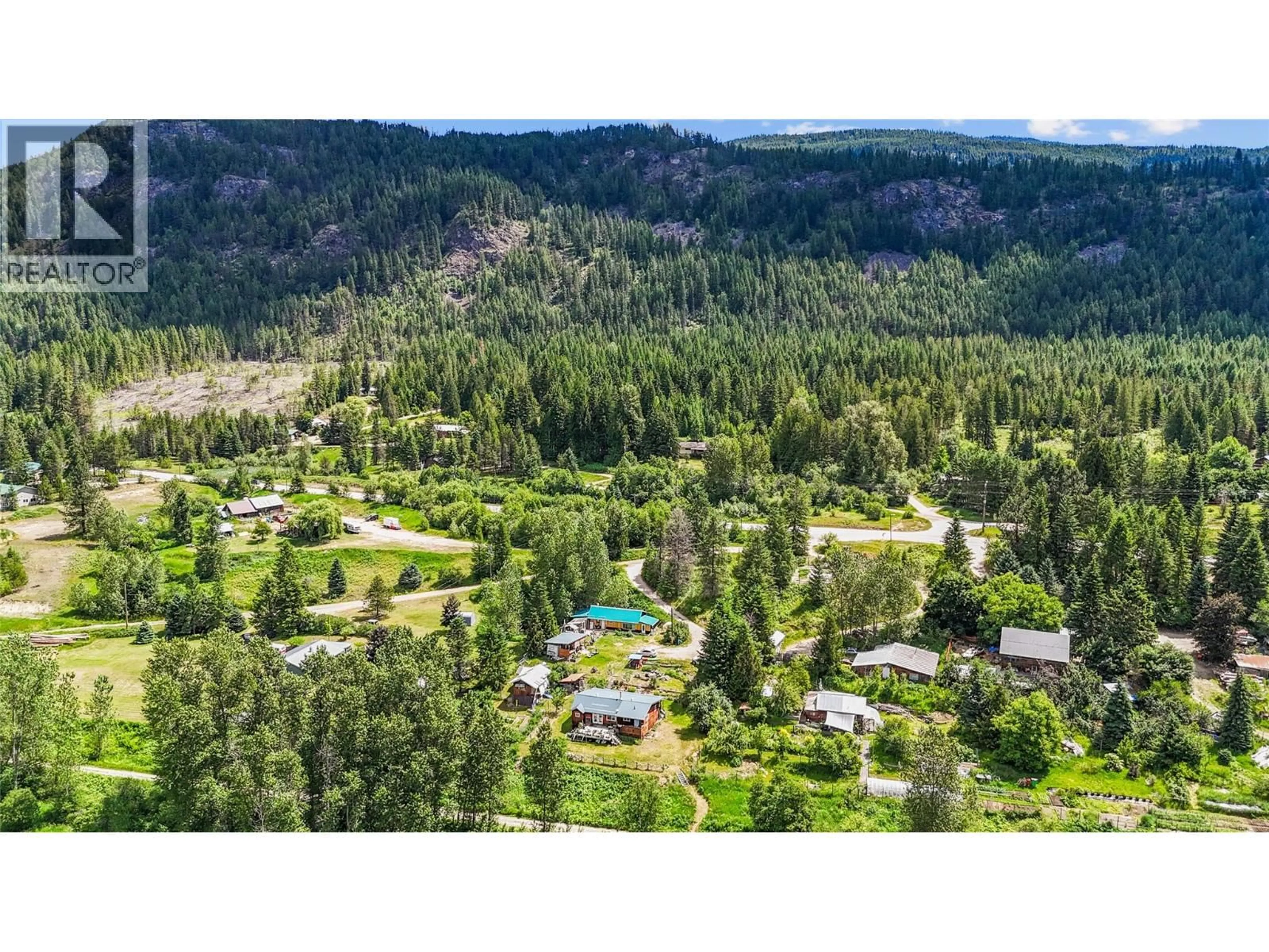 A pic from outside/outdoor area/front of a property/back of a property/a pic from drone, mountain view for 6123 TELFORD ROAD, Winlaw British Columbia V0G2J0