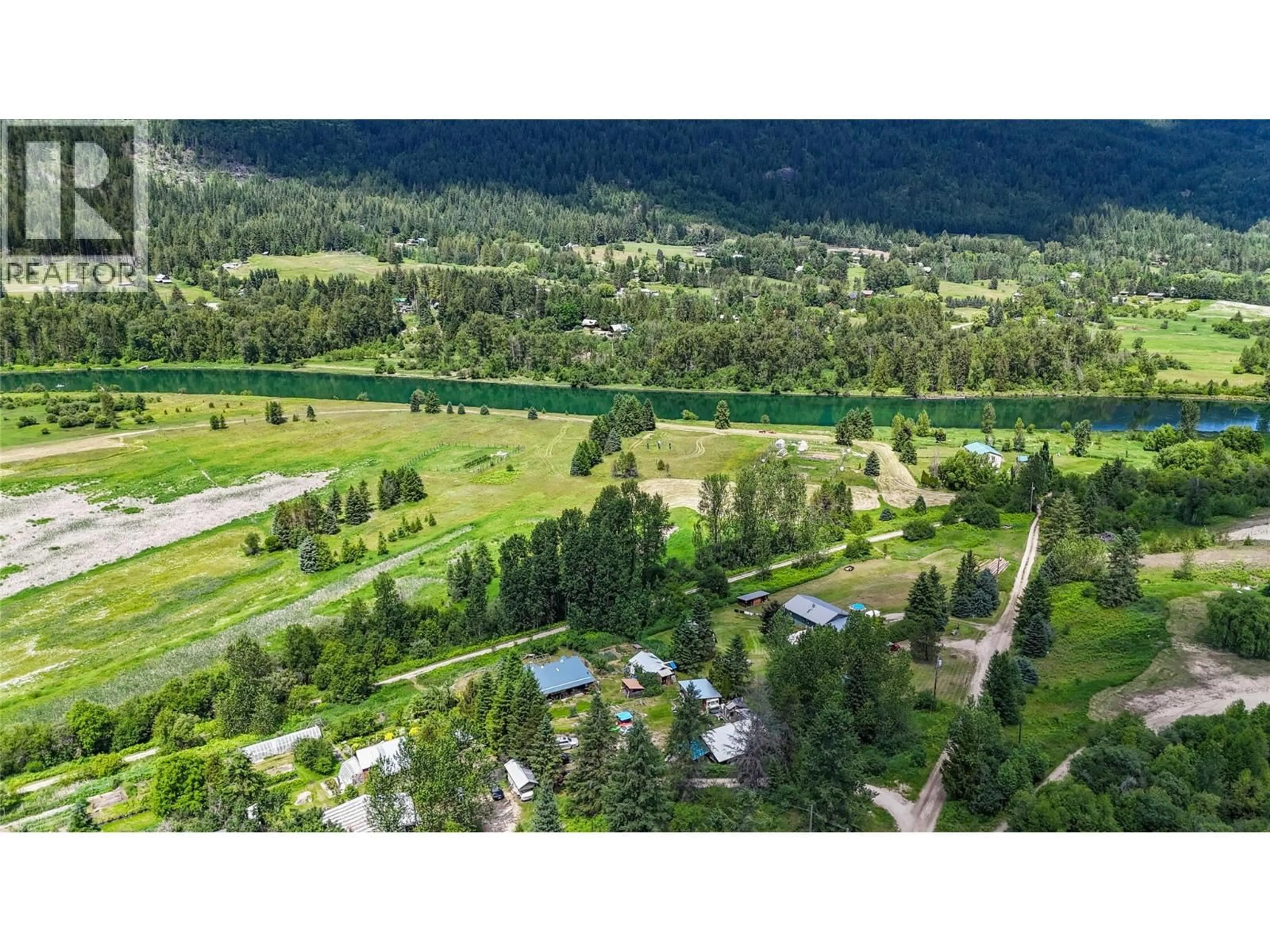 A pic from outside/outdoor area/front of a property/back of a property/a pic from drone, forest/trees view for 6123 TELFORD ROAD, Winlaw British Columbia V0G2J0