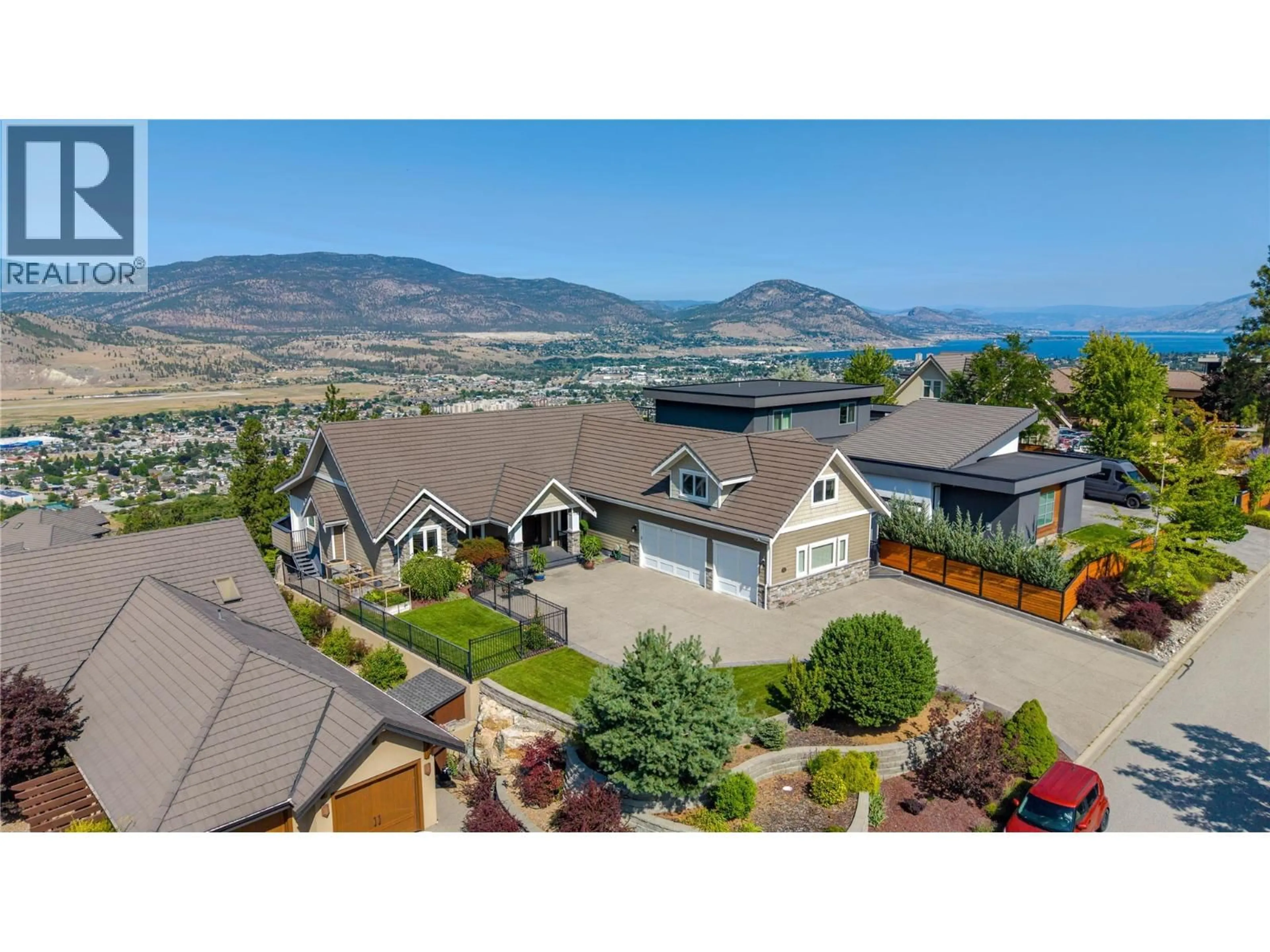 A pic from outside/outdoor area/front of a property/back of a property/a pic from drone, mountain view for 4 - 112 PENROSE COURT, Penticton British Columbia V2A9B6