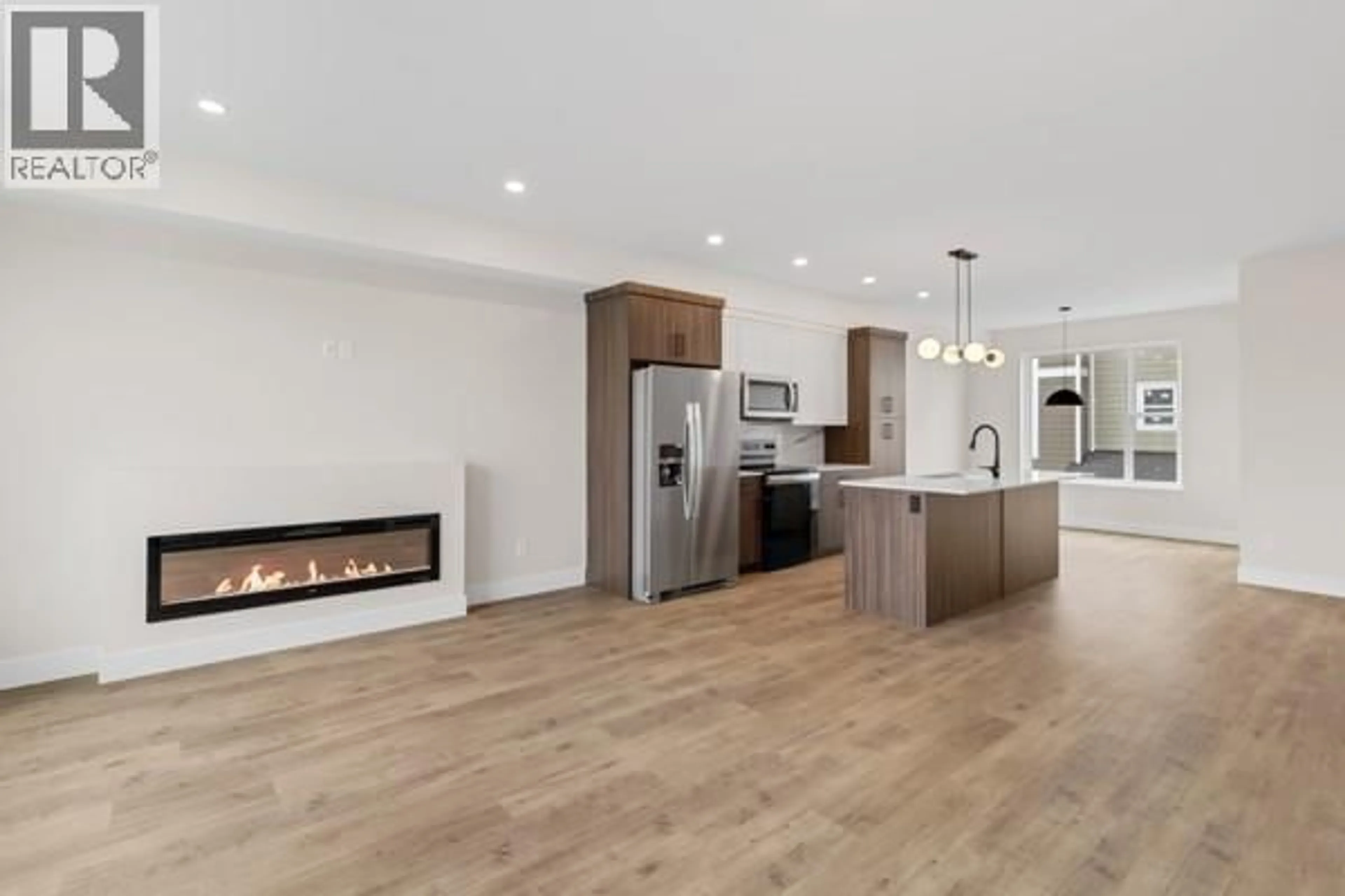 Open concept kitchen, wood/laminate floor for 117 - 2686 TRANQUILLE ROAD, Kamloops British Columbia V2B3P1
