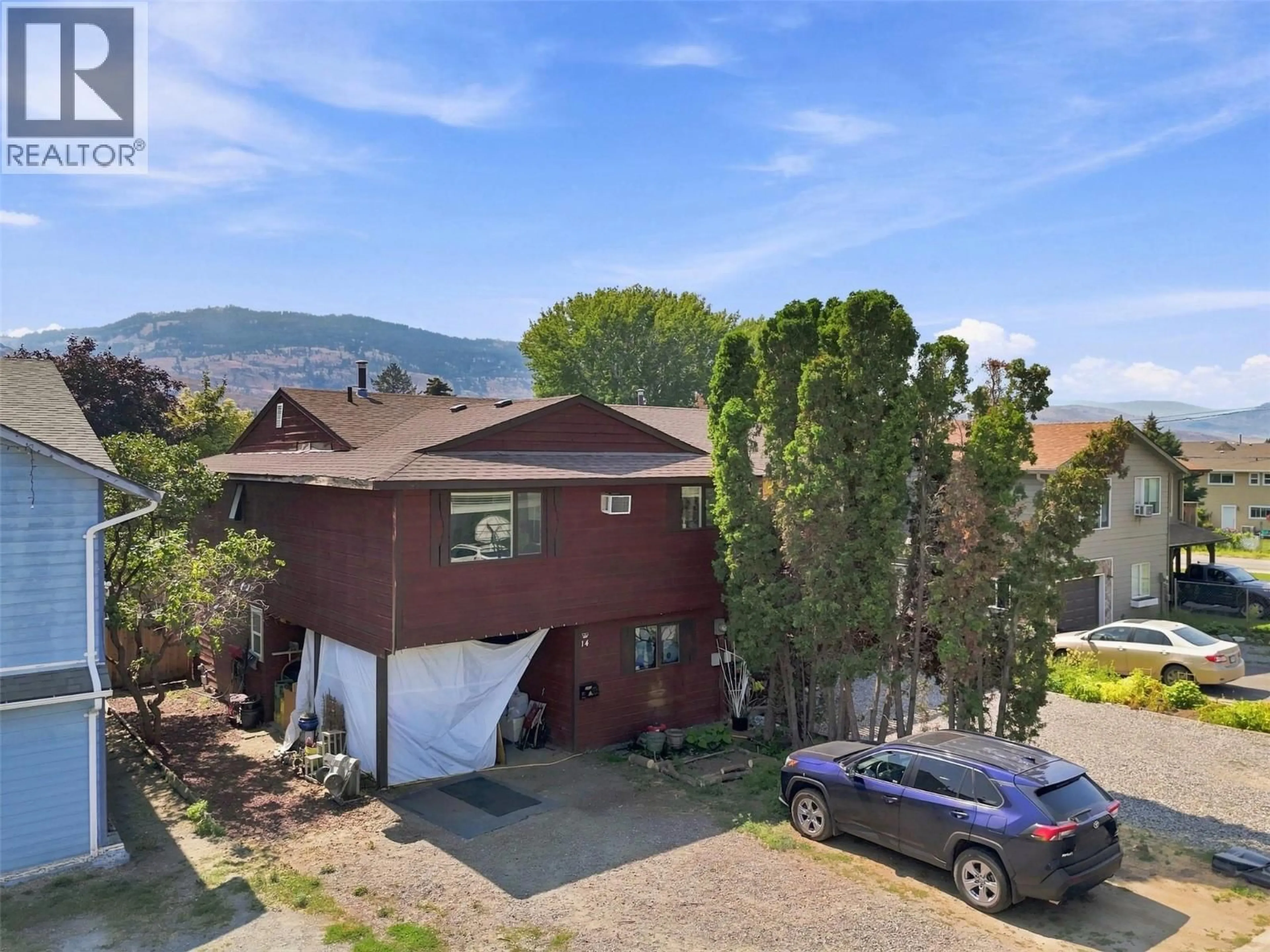 A pic from outside/outdoor area/front of a property/back of a property/a pic from drone, mountain view for 14 - 685 SINGH STREET, Kamloops British Columbia V2B5C5
