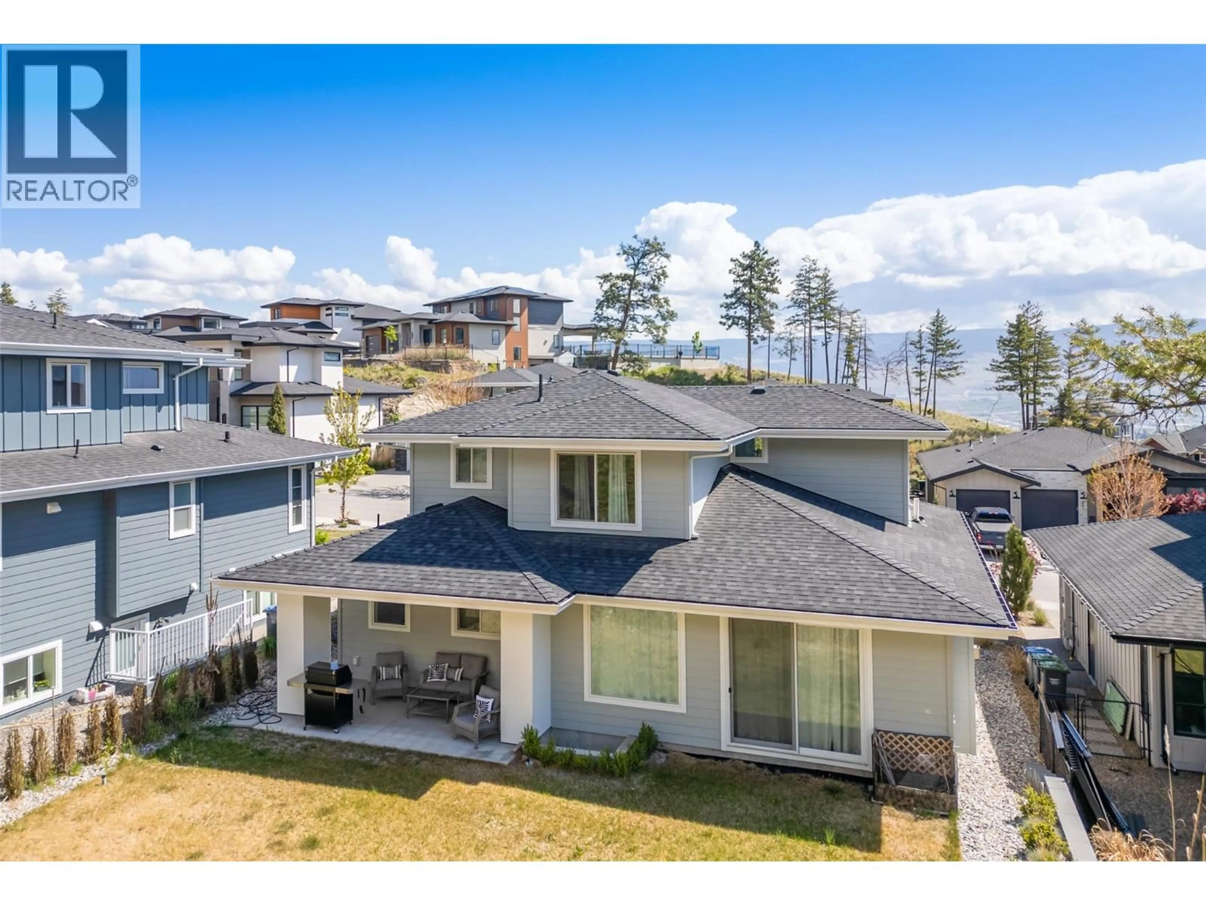 A pic from outside/outdoor area/front of a property/back of a property/a pic from drone, water/lake/river/ocean view for 206 ECHO RIDGE, Kelowna British Columbia V1V0C9