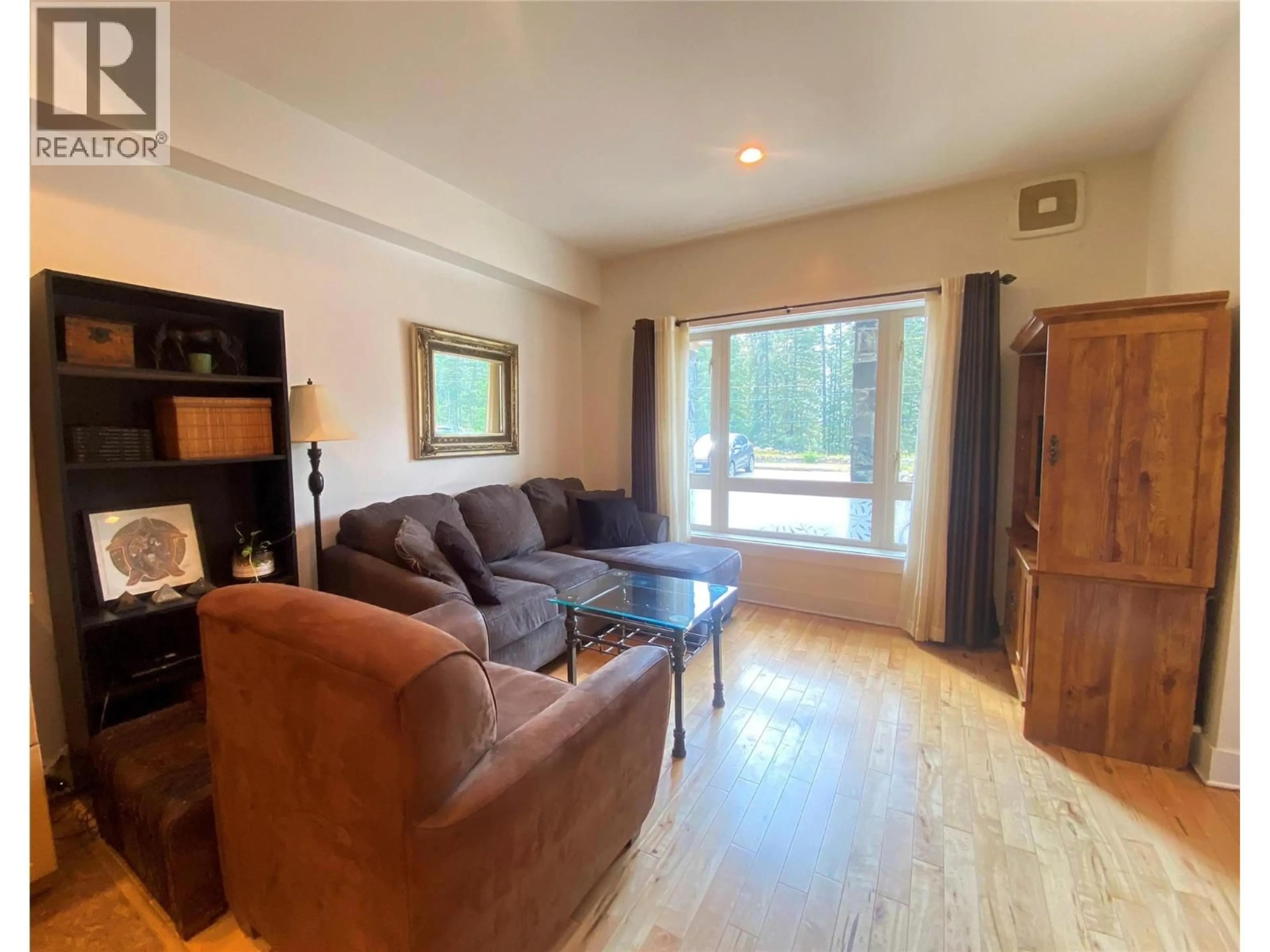 Living room with furniture, wood/laminate floor for 4 - 912 SLOCAN STREET, Slocan British Columbia V0G2C0