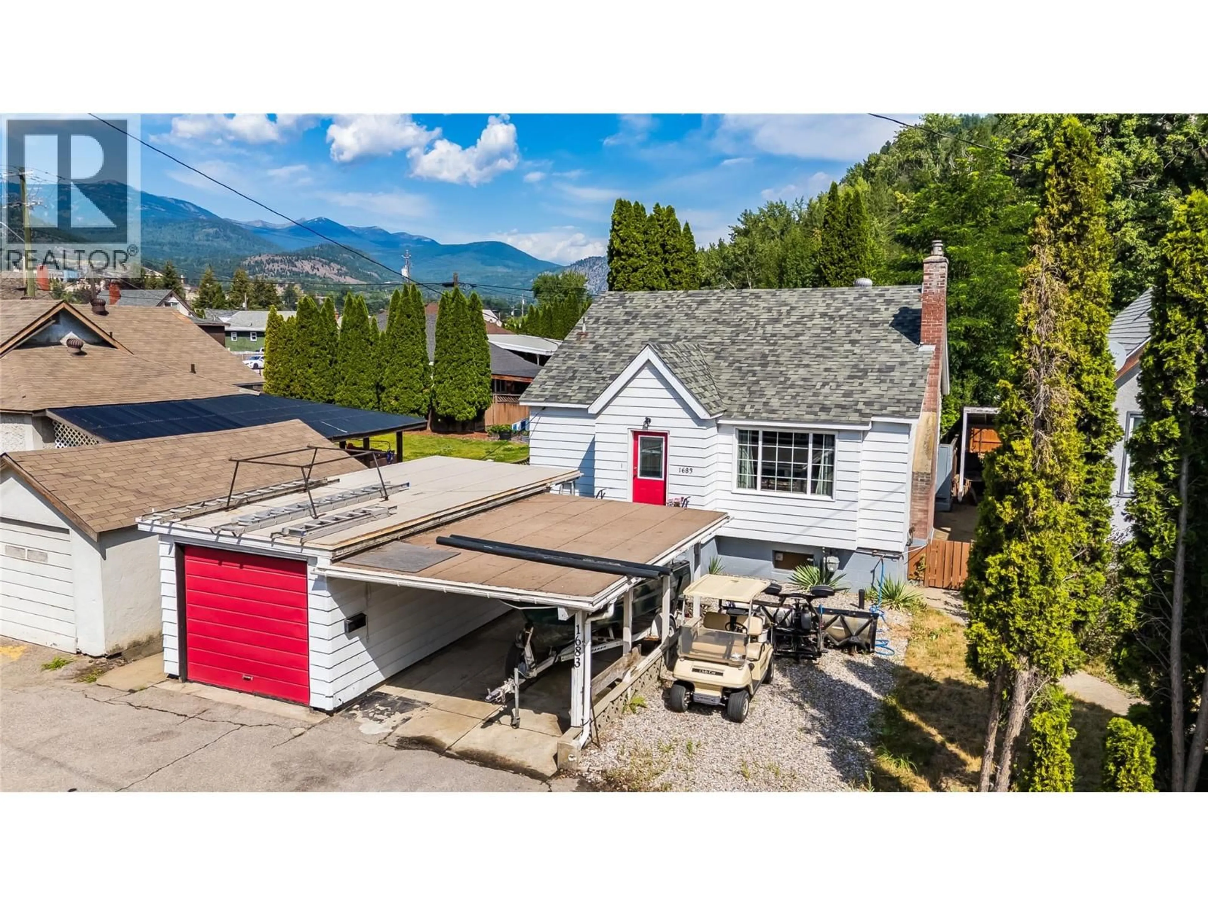 A pic from outside/outdoor area/front of a property/back of a property/a pic from drone, mountain view for 1683 BAILEY STREET, Trail British Columbia V1R1W5