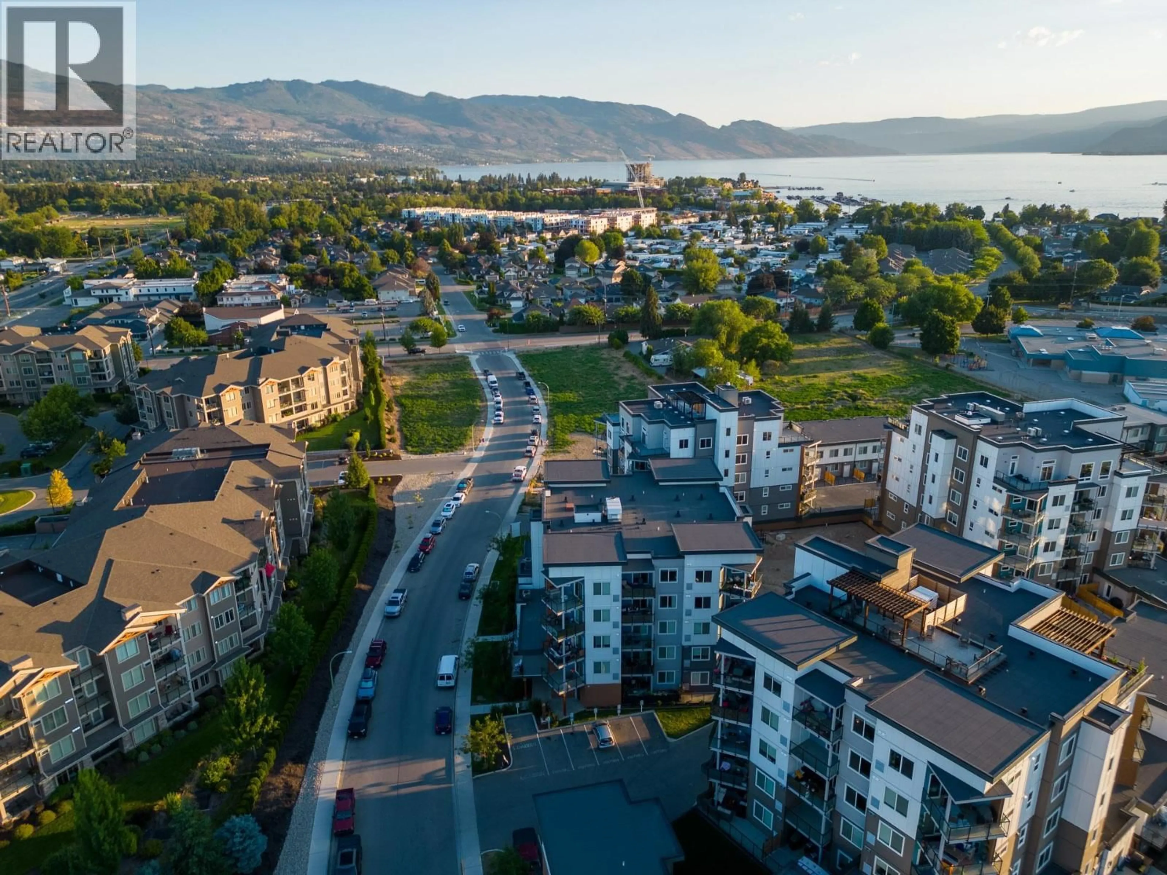 A pic from outside/outdoor area/front of a property/back of a property/a pic from drone, mountain view for 201 - 3630 MISSION SPRINGS DRIVE, Kelowna British Columbia V1S0B2