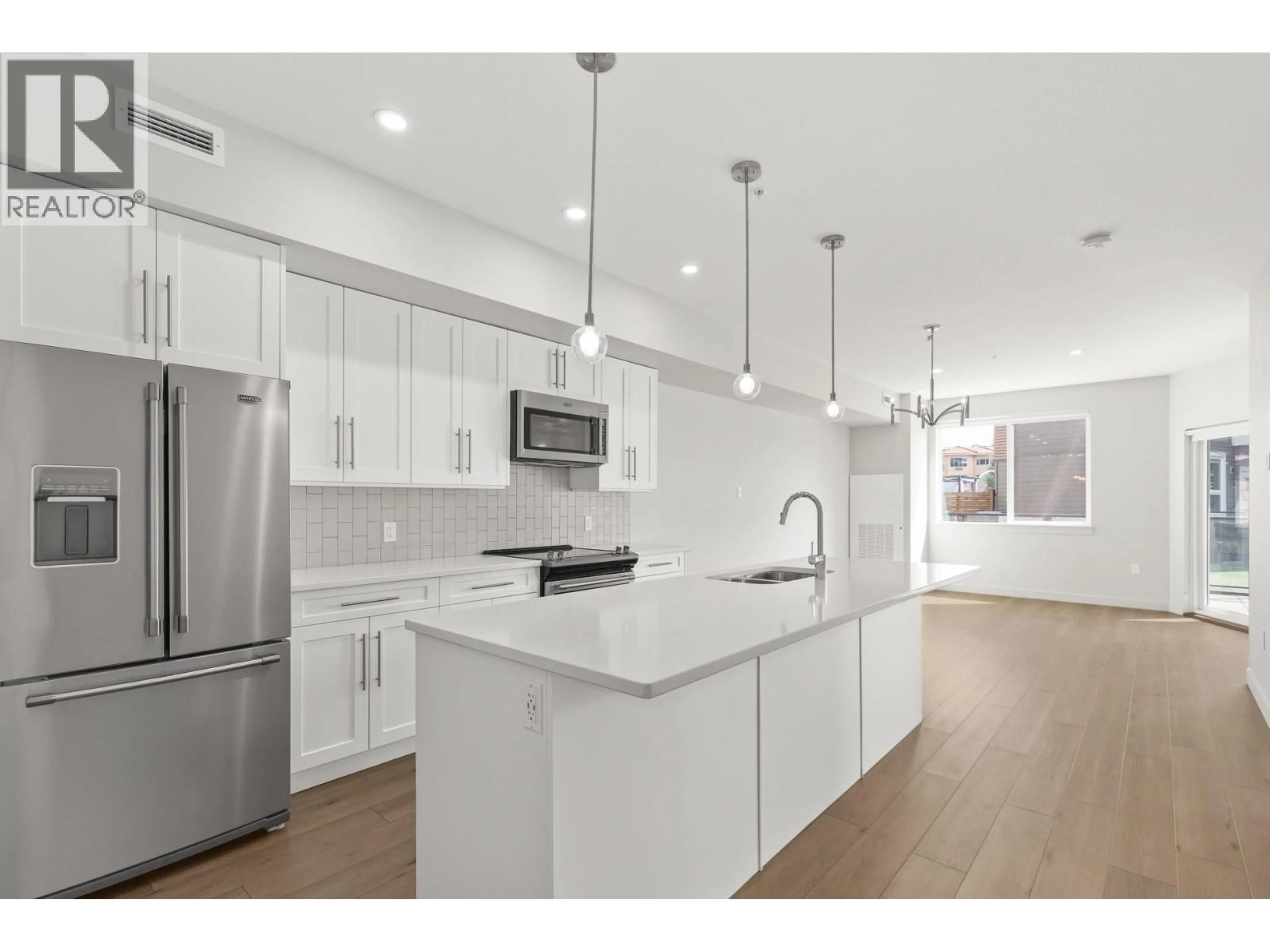 Open concept kitchen, unknown for 201 - 3630 MISSION SPRINGS DRIVE, Kelowna British Columbia V1S0B2