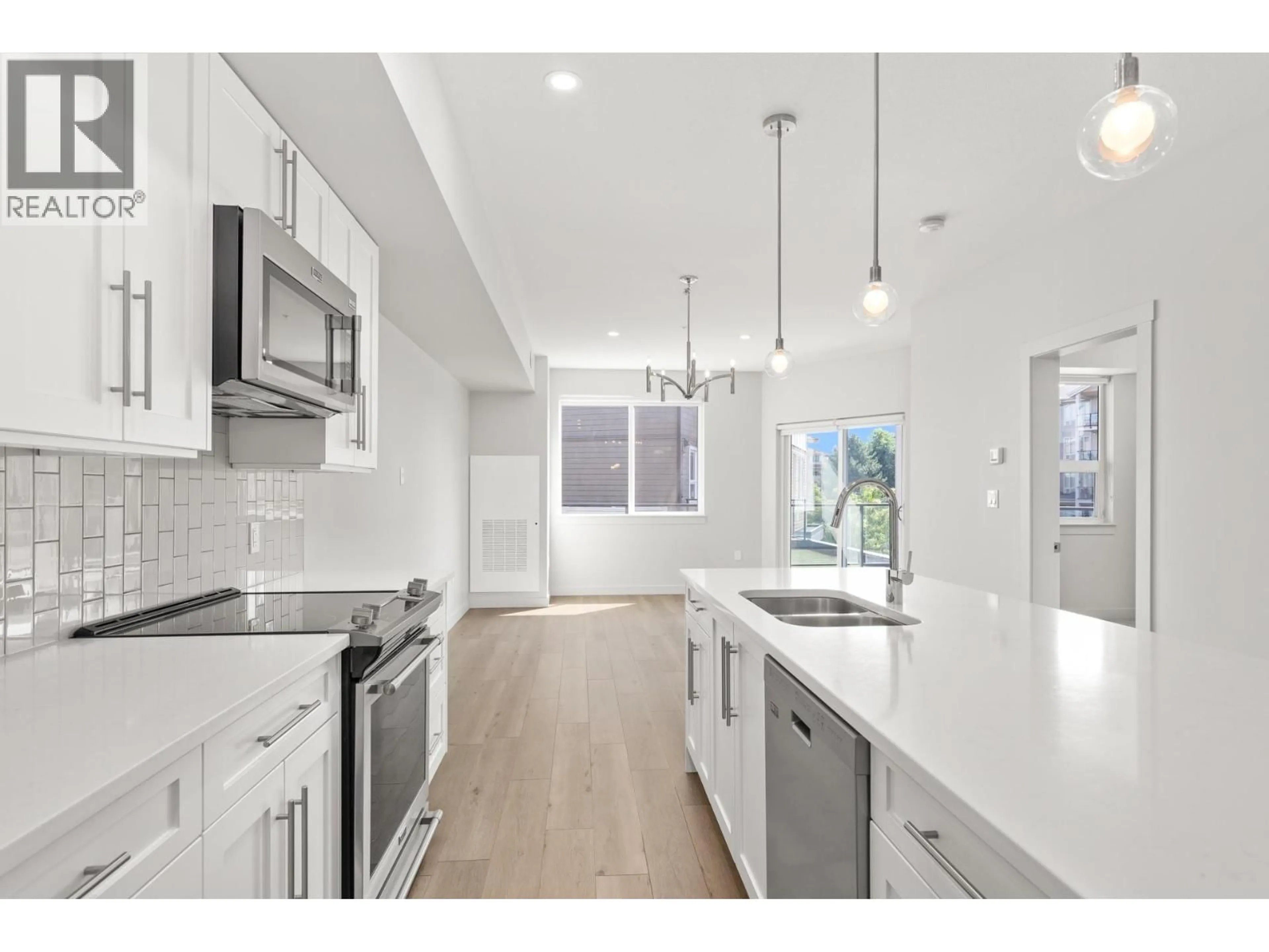 Open concept kitchen, unknown for 201 - 3630 MISSION SPRINGS DRIVE, Kelowna British Columbia V1S0B2
