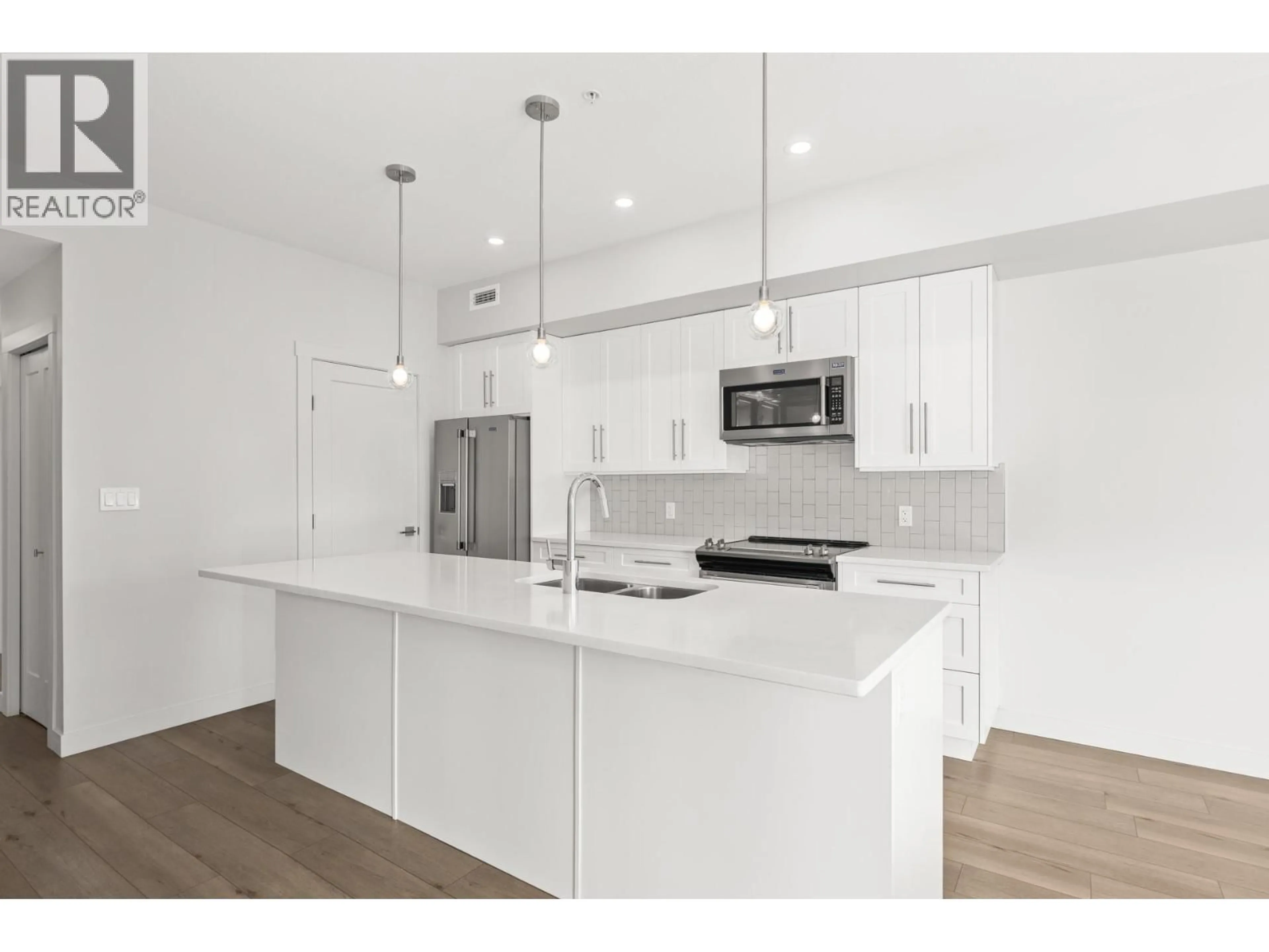 Open concept kitchen, unknown for 201 - 3630 MISSION SPRINGS DRIVE, Kelowna British Columbia V1S0B2