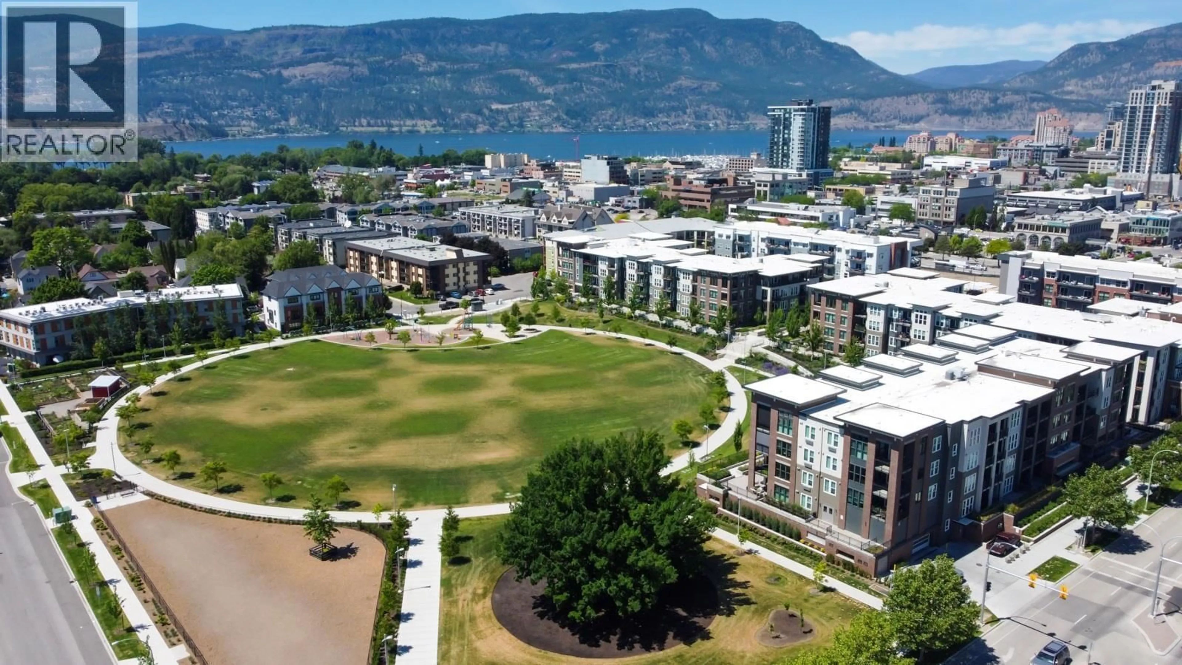 A pic from outside/outdoor area/front of a property/back of a property/a pic from drone, mountain view for 102 - 1775 CHAPMAN PLACE, Kelowna British Columbia V1Y0G3