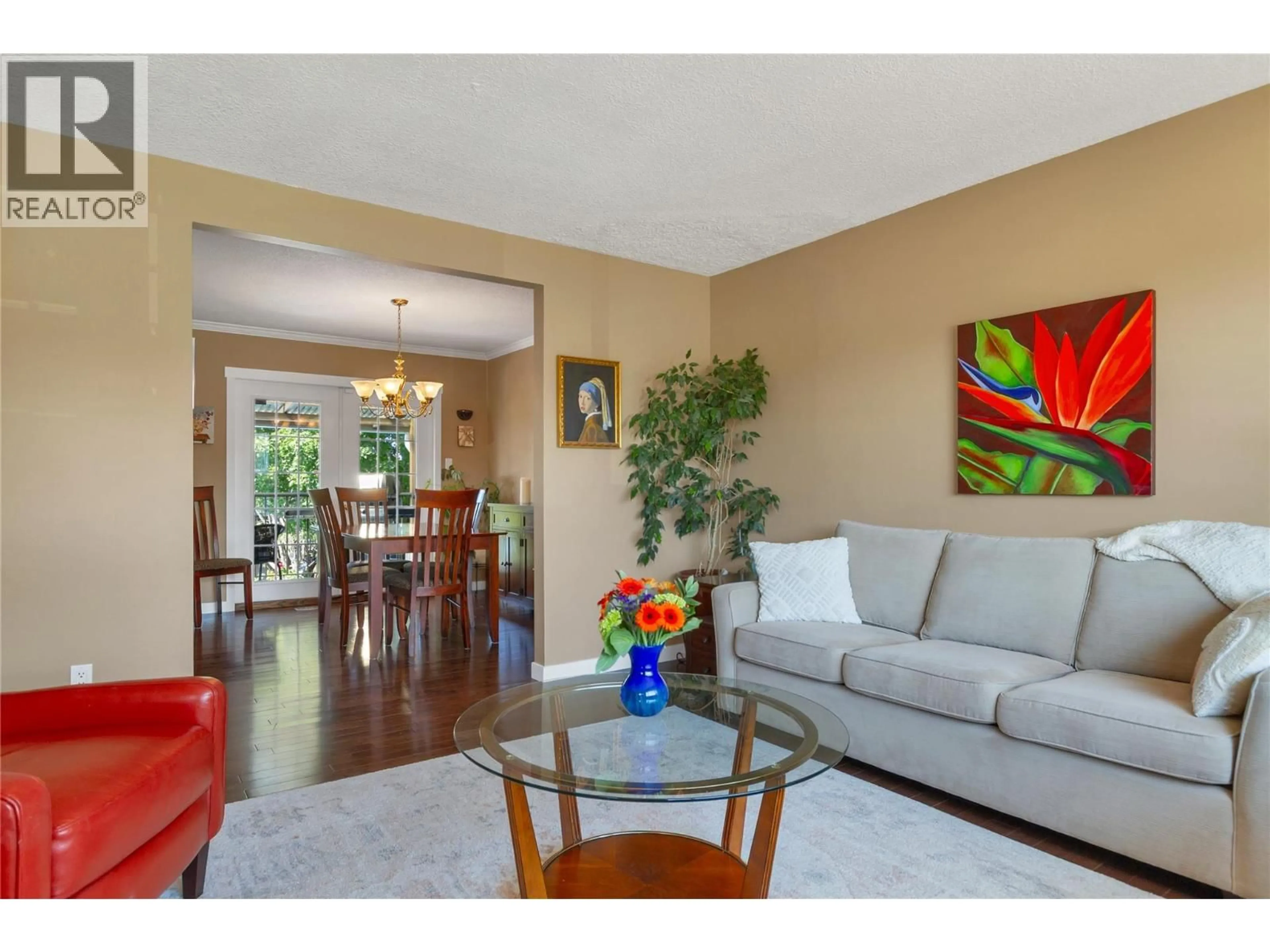 Living room with furniture, wood/laminate floor for 1303 41 AVENUE, Vernon British Columbia V1T8A6