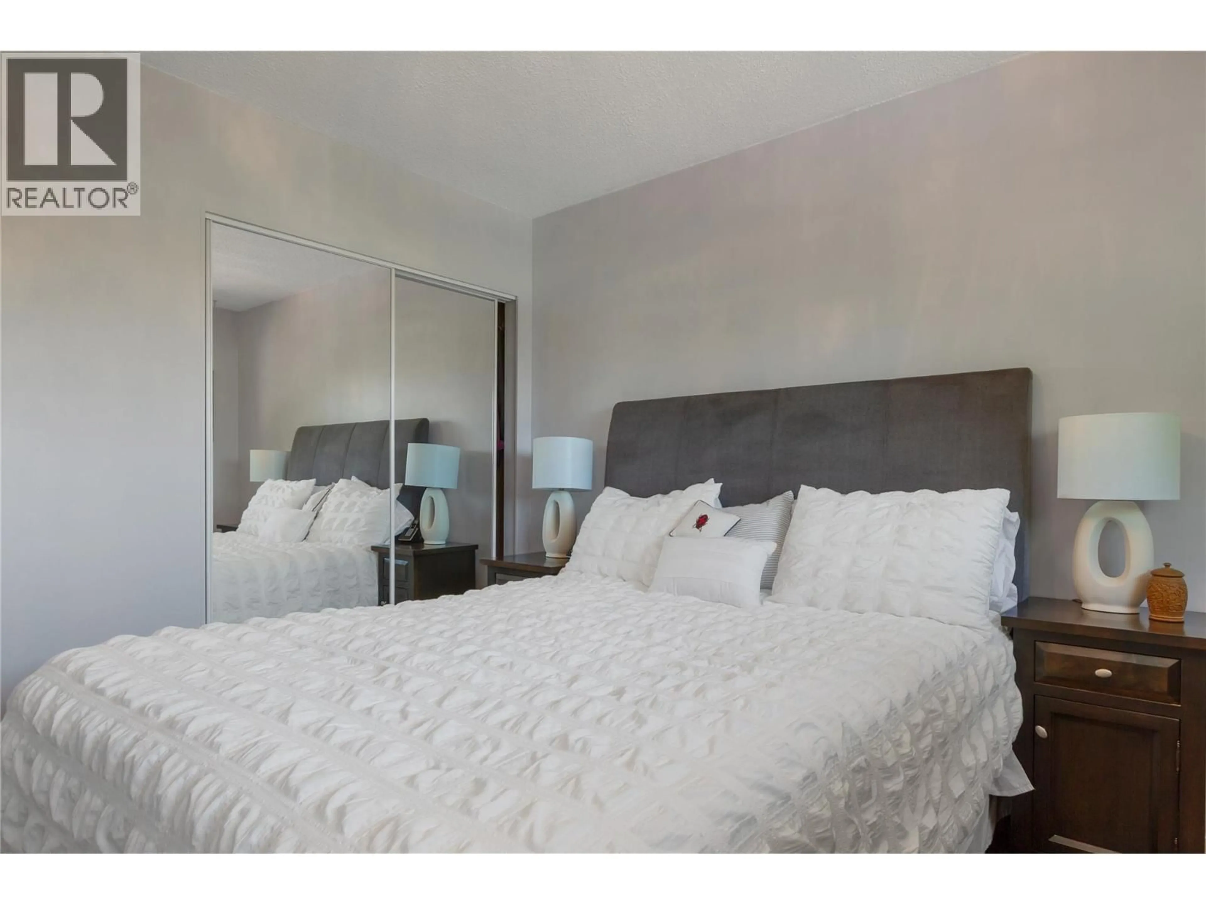 Bedroom with bed, unknown for 1303 41 AVENUE, Vernon British Columbia V1T8A6