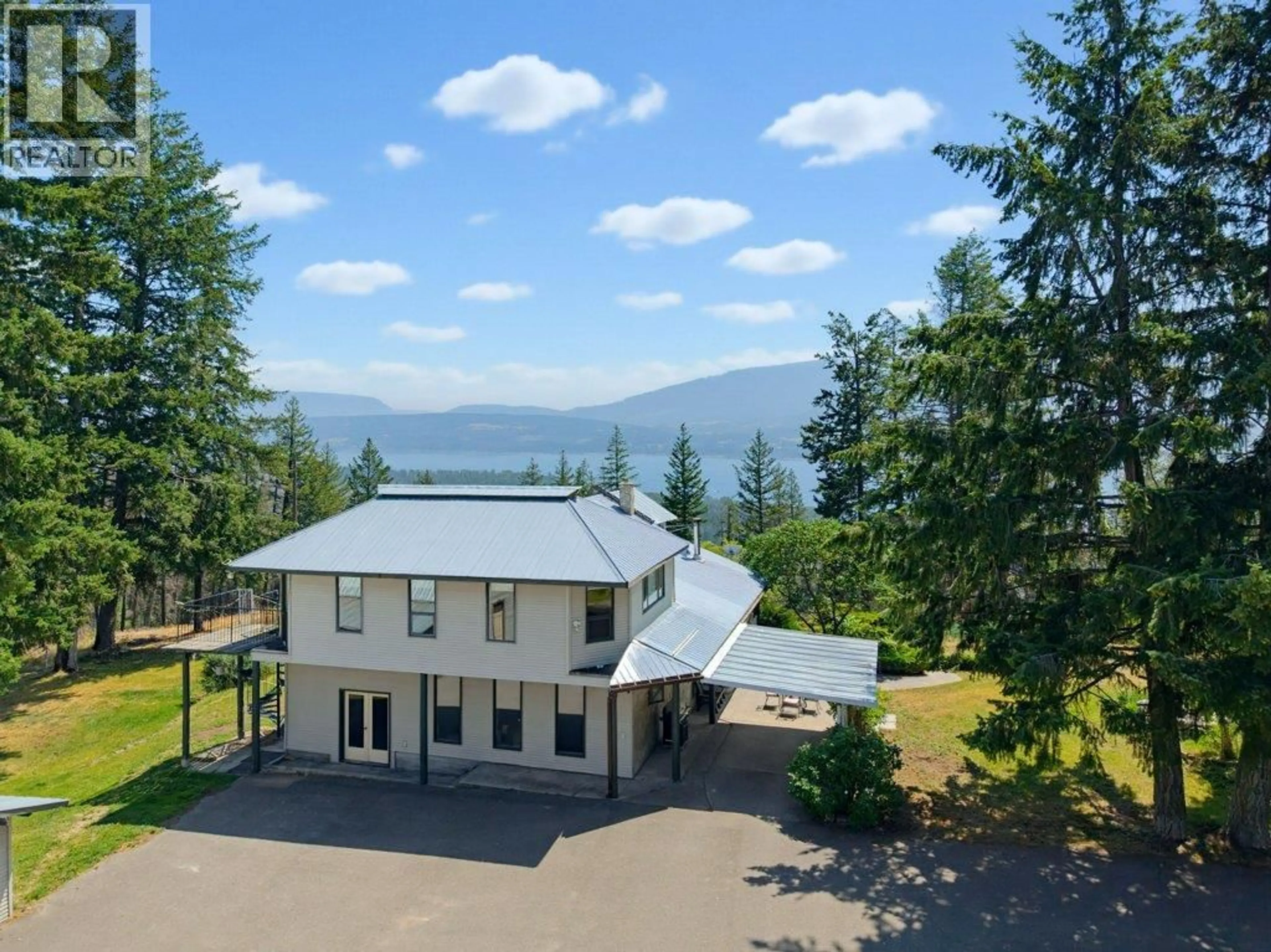 A pic from outside/outdoor area/front of a property/back of a property/a pic from drone, mountain view for 1722 LEE CREEK DRIVE, Lee Creek British Columbia V0E1M4