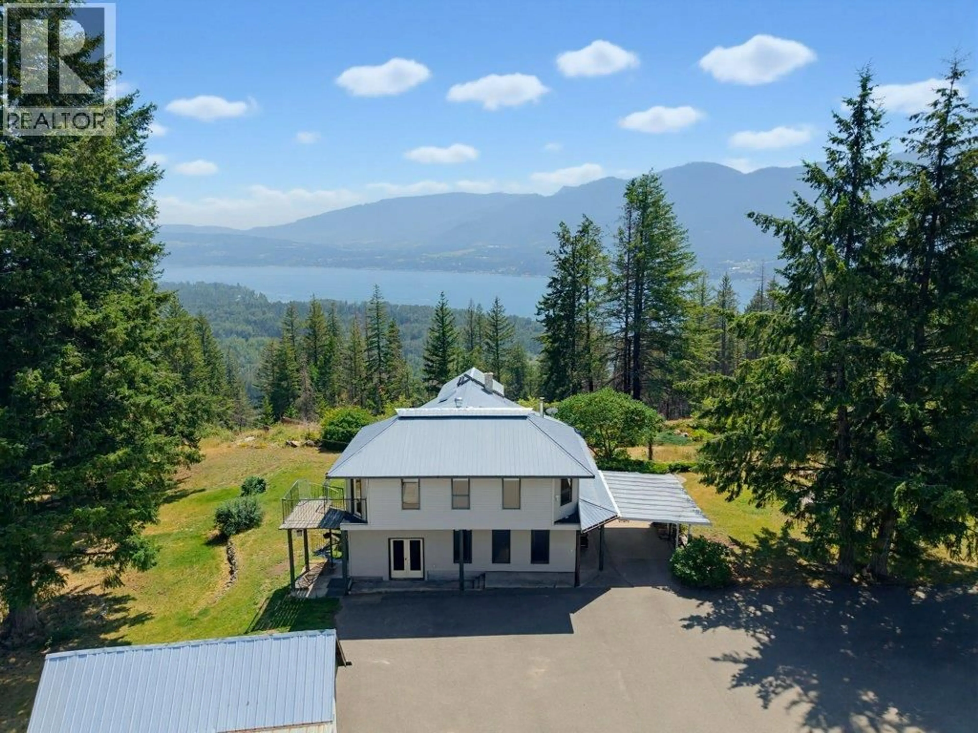 A pic from outside/outdoor area/front of a property/back of a property/a pic from drone, mountain view for 1722 LEE CREEK DRIVE, Lee Creek British Columbia V0E1M4