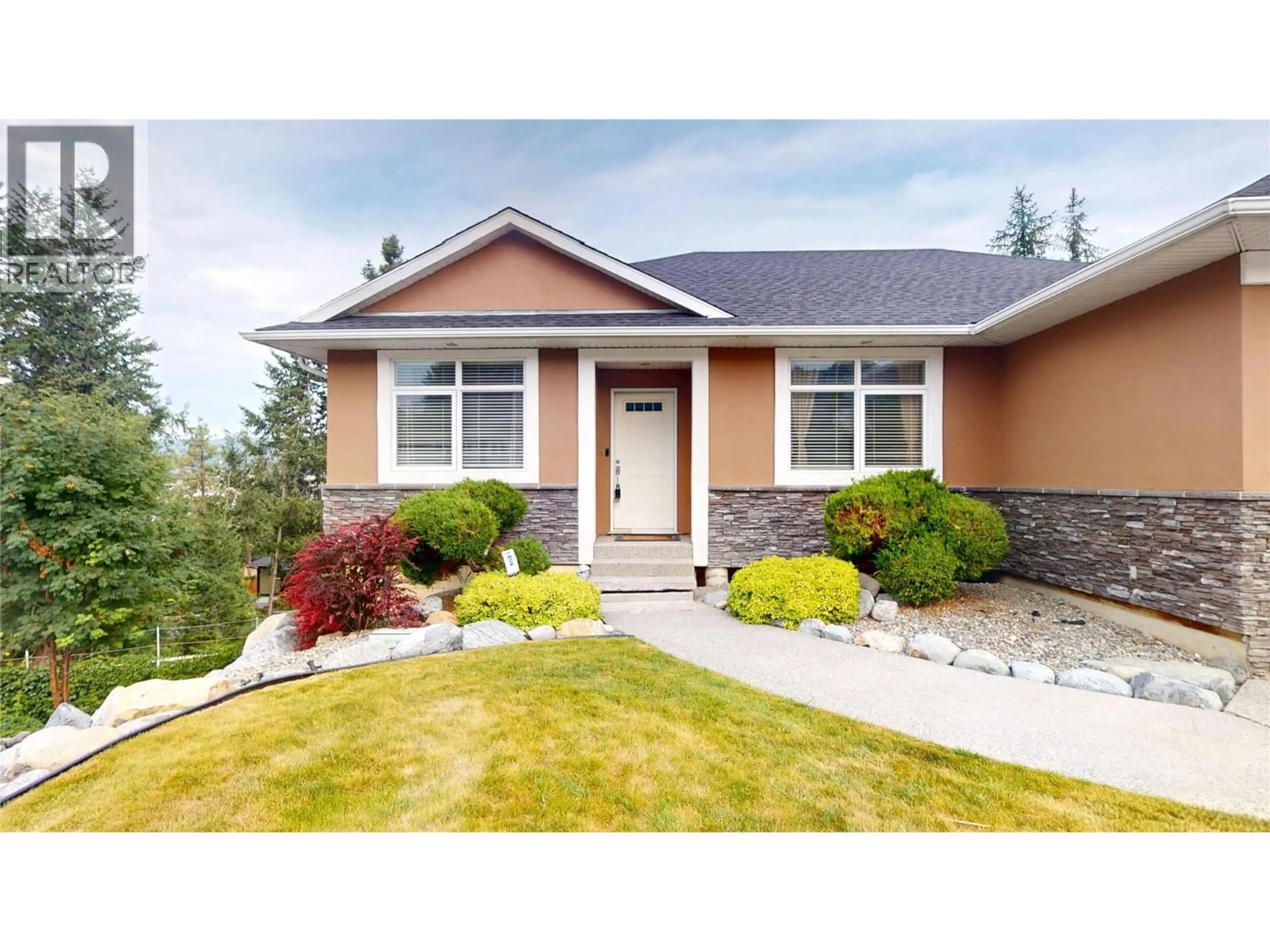 Home with vinyl exterior material, street for 1631 MT. PYRAMID CRESCENT, Cranbrook British Columbia V1C6K8