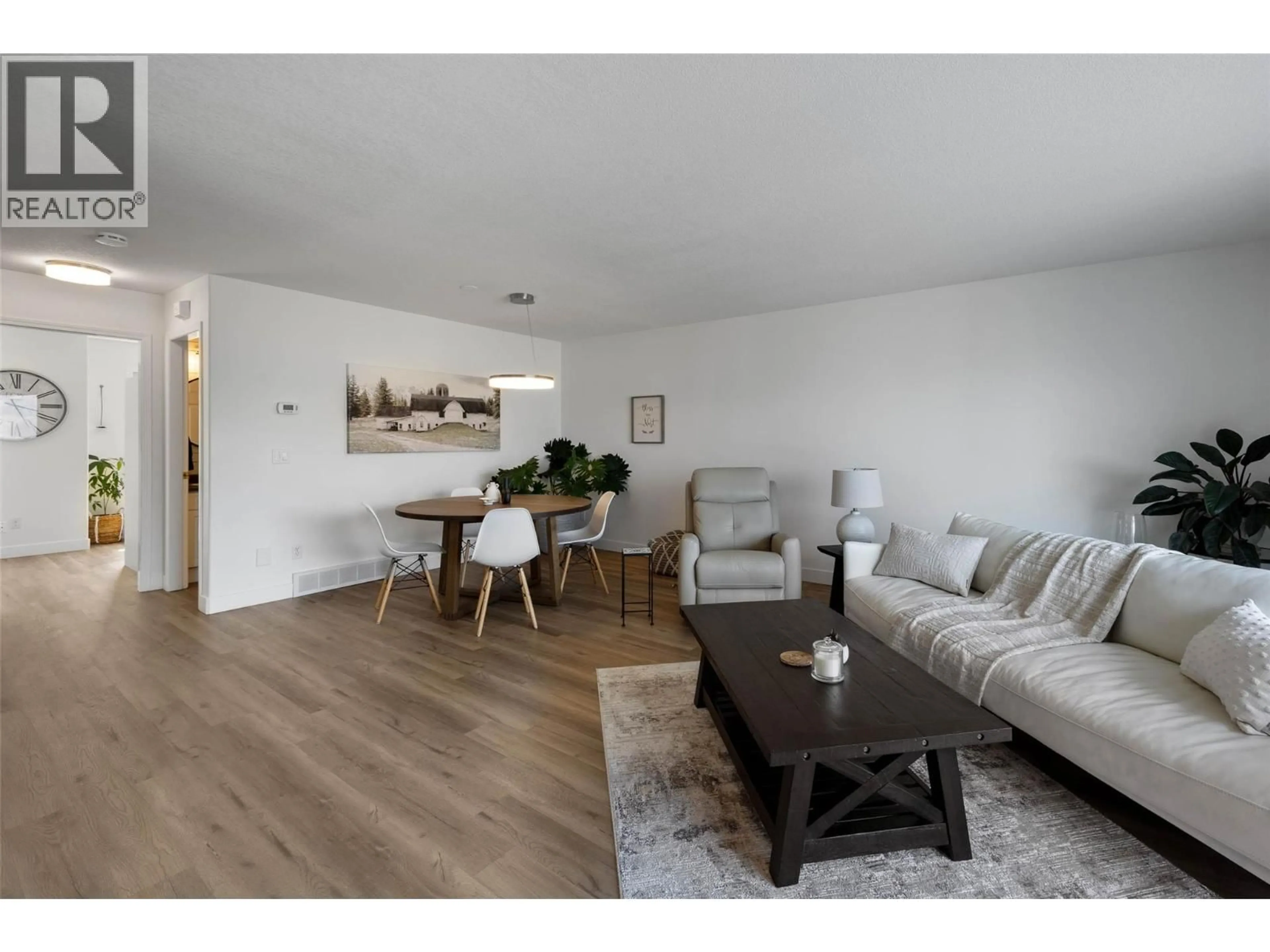 Living room with furniture, wood/laminate floor for 24 - 255 PEMBERTON TERRACE, Kamloops British Columbia V2C6R2