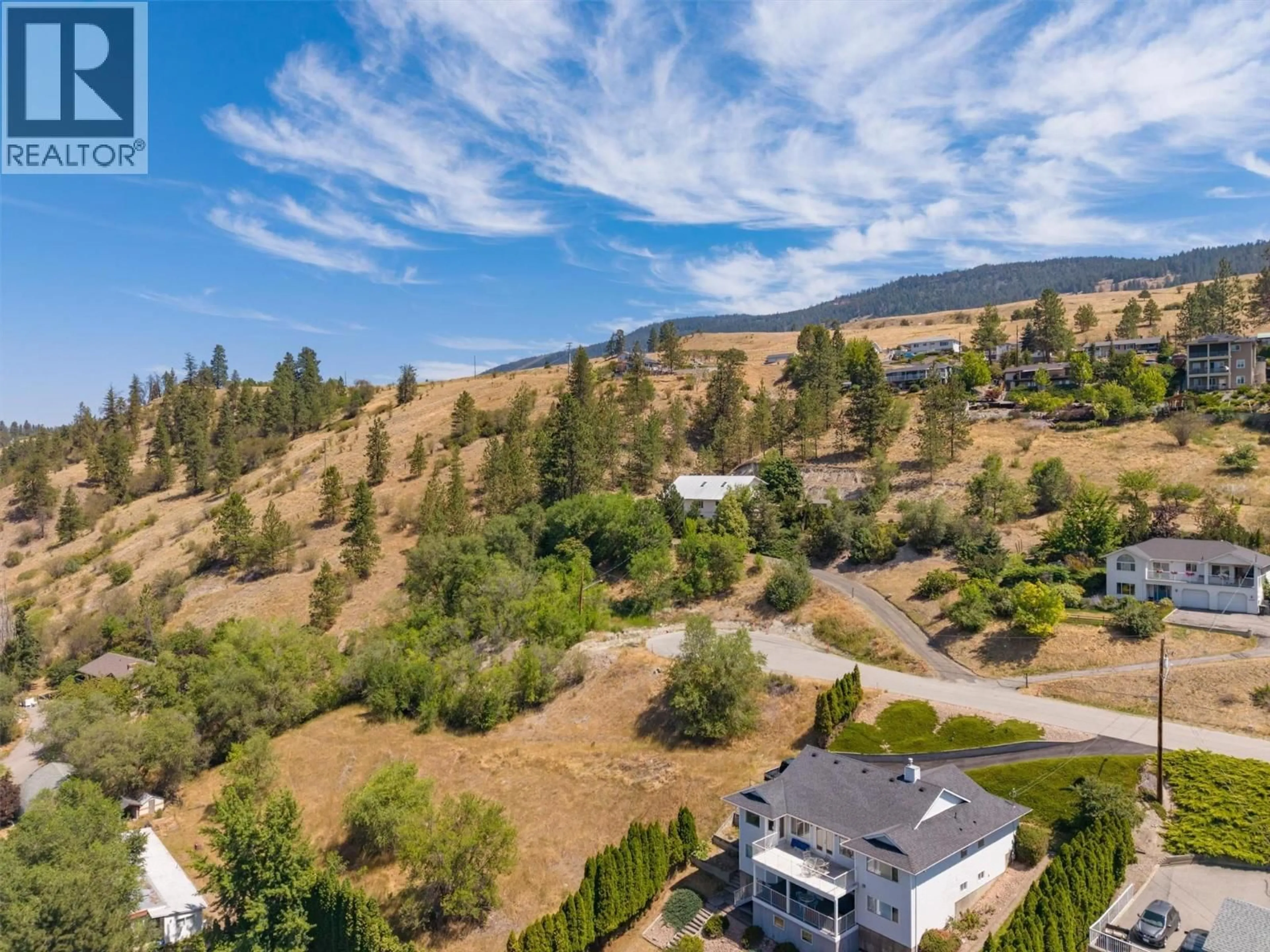 A pic from outside/outdoor area/front of a property/back of a property/a pic from drone, mountain view for 11451 DAKOTA ROAD, Lake Country British Columbia V4V1X1