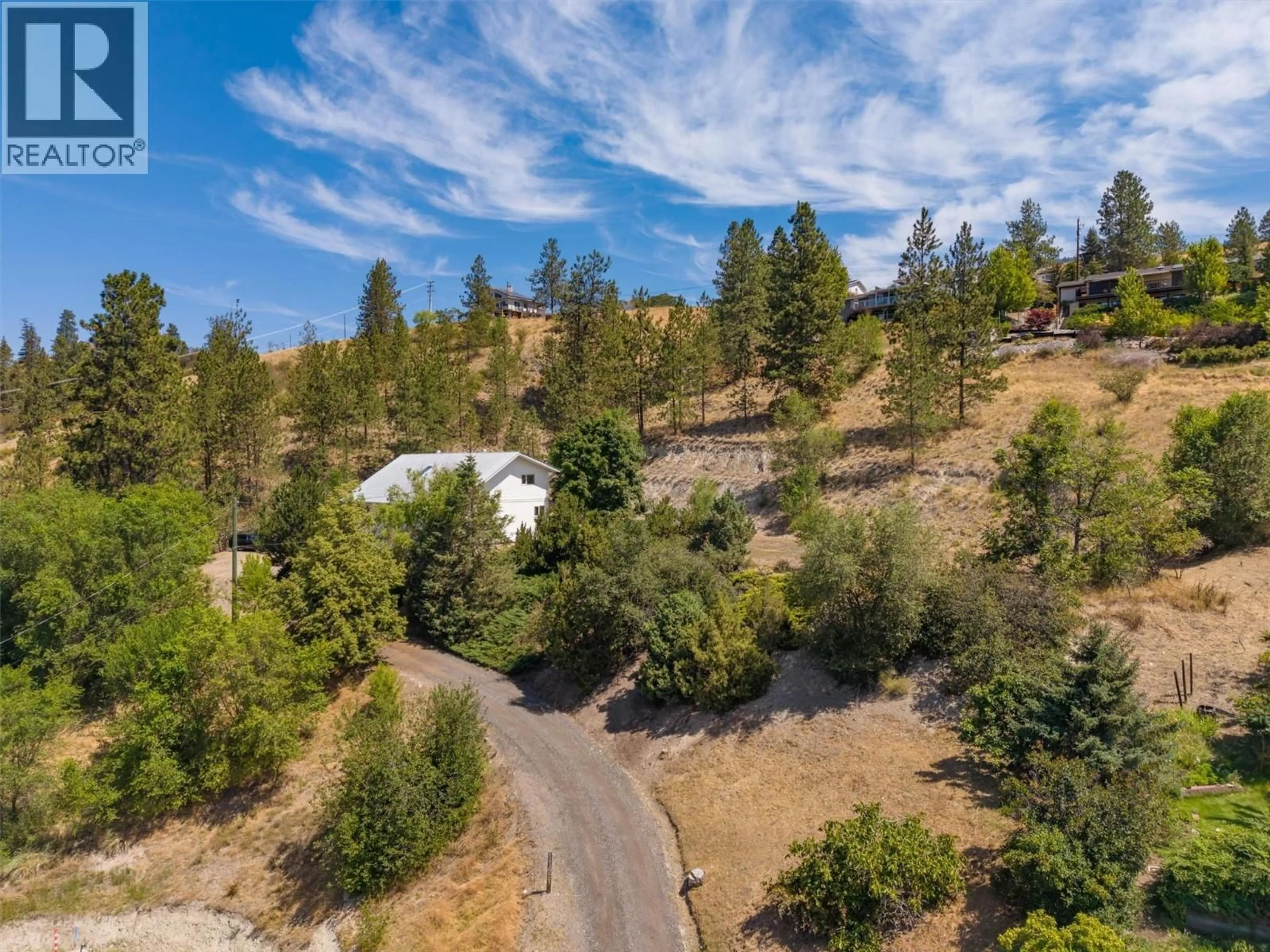 A pic from outside/outdoor area/front of a property/back of a property/a pic from drone, forest/trees view for 11451 DAKOTA ROAD, Lake Country British Columbia V4V1X1