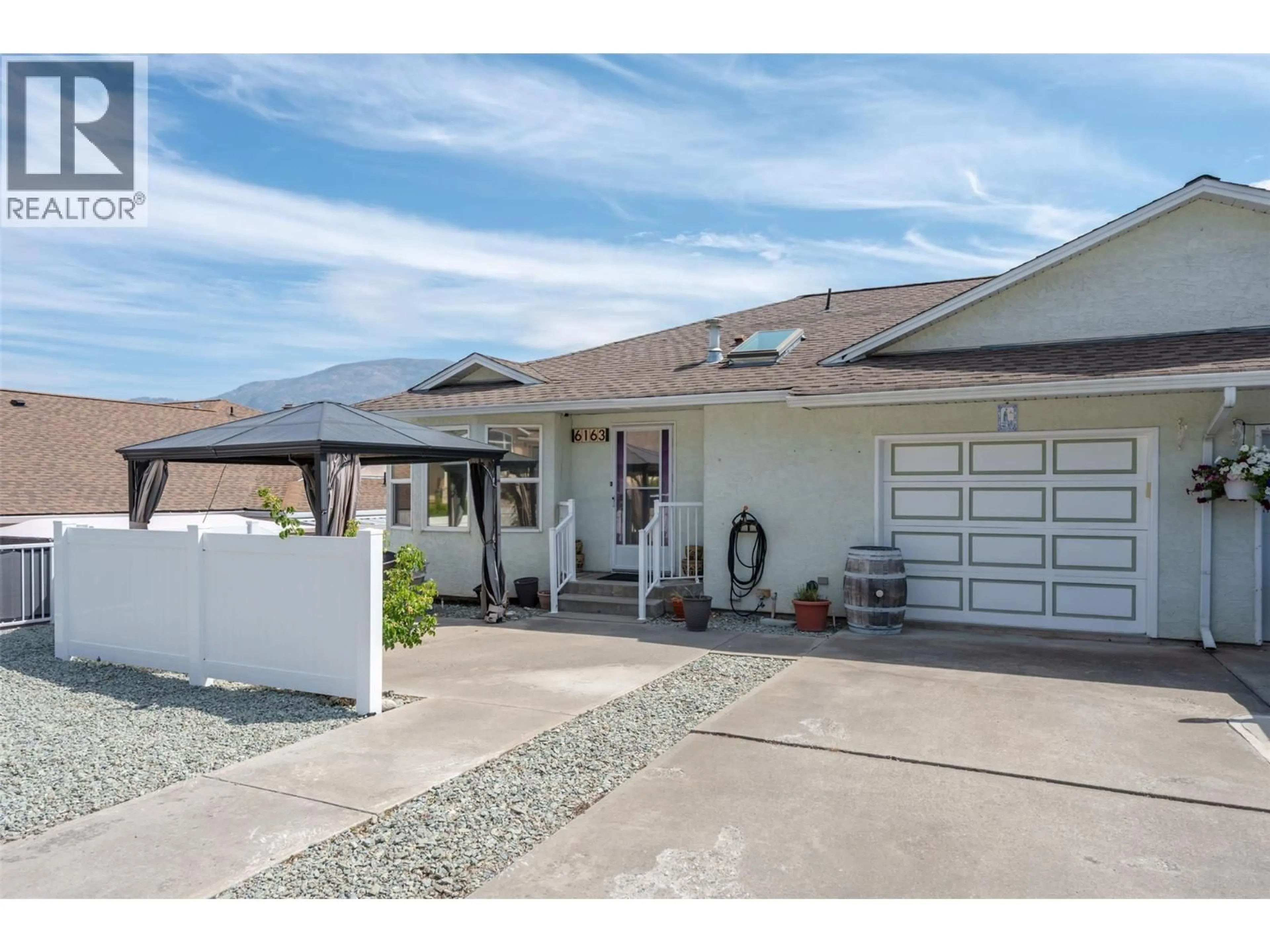 Home with vinyl exterior material, street for 1 - 6163 SAINT MARTIN PLACE, Oliver British Columbia V0H1T0
