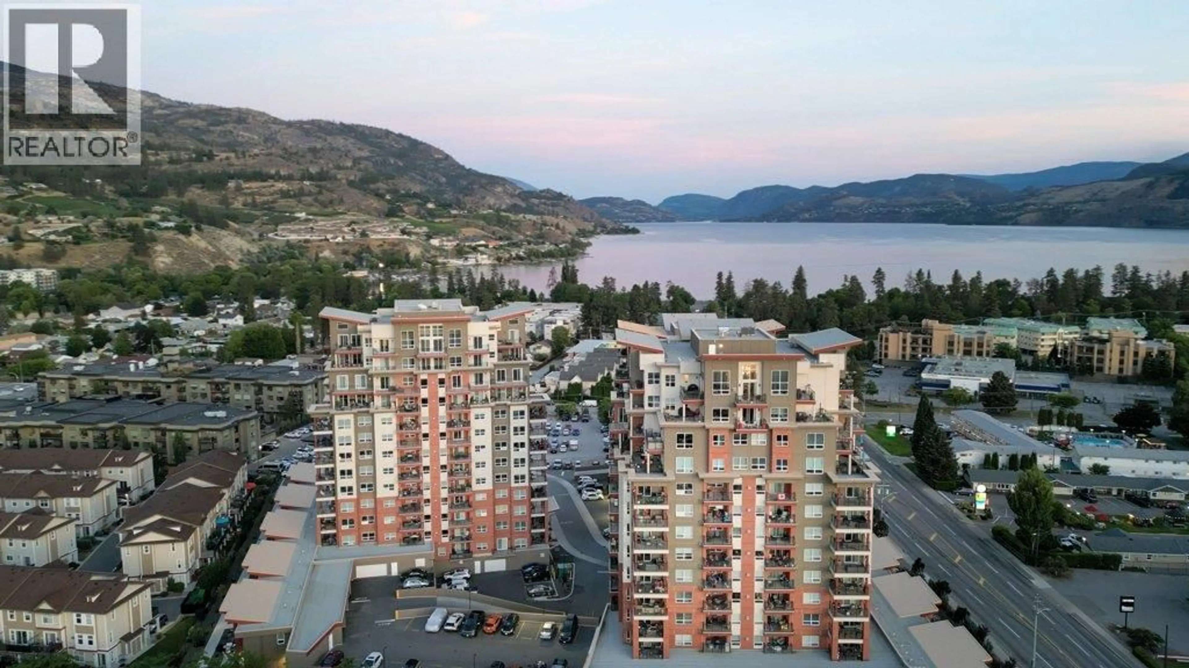 A pic from outside/outdoor area/front of a property/back of a property/a pic from drone, water/lake/river/ocean view for 706 - 3346 SKAHA LAKE ROAD, Penticton British Columbia V2A0H6