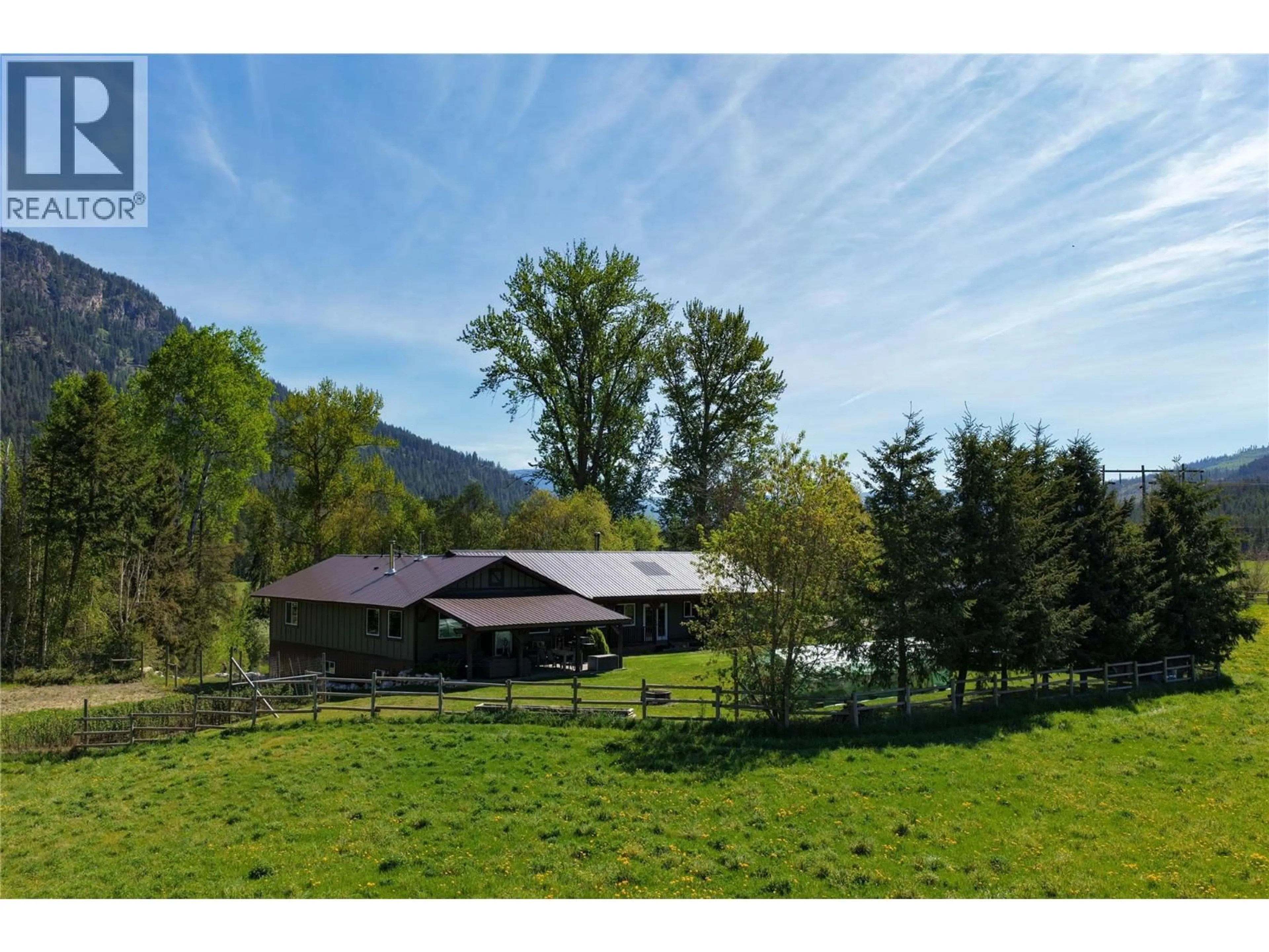 A pic from outside/outdoor area/front of a property/back of a property/a pic from drone, mountain view for 26 BYERS ROAD, Cherryville British Columbia V0E2G1
