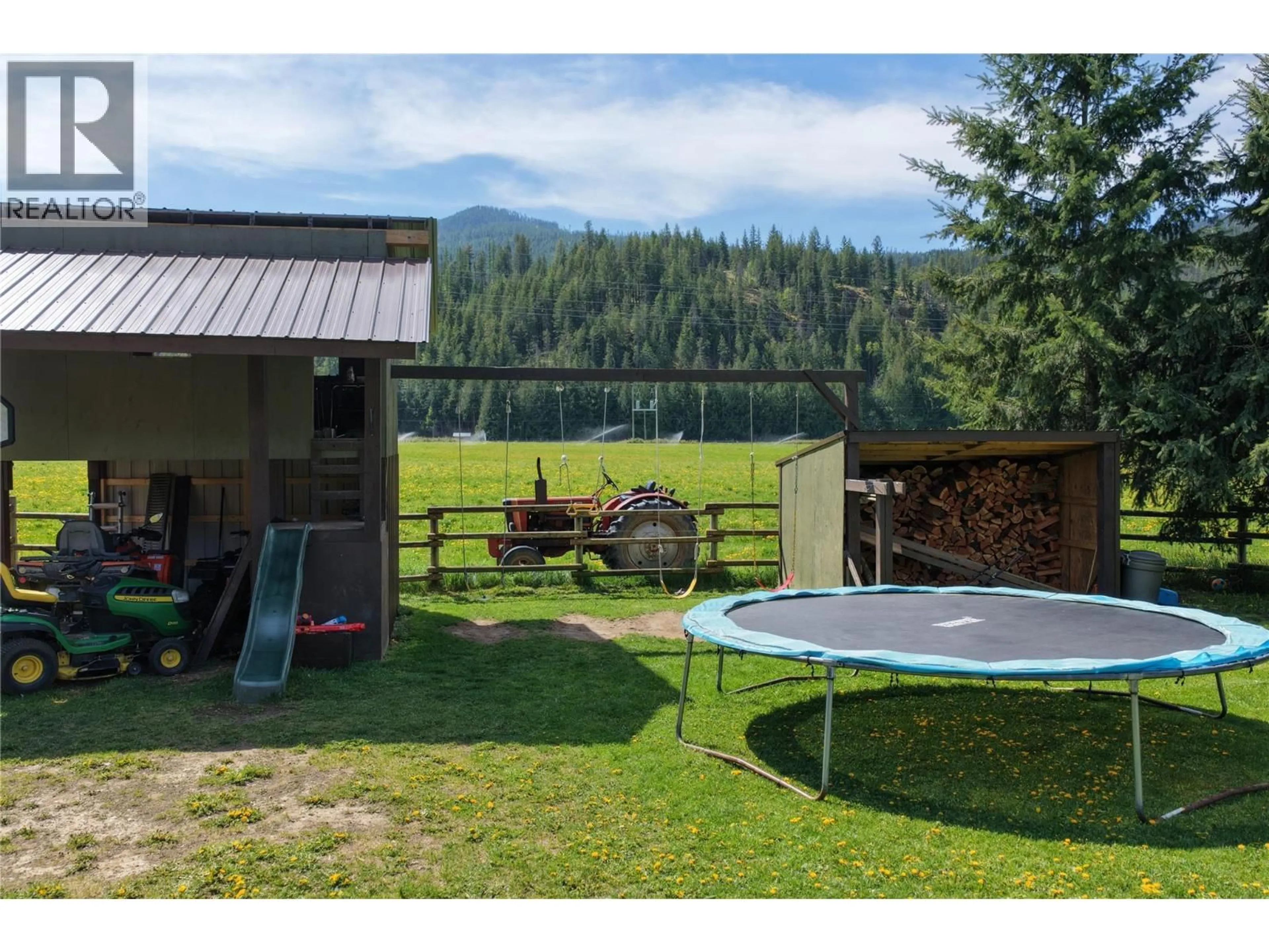A pic from outside/outdoor area/front of a property/back of a property/a pic from drone, mountain view for 26 BYERS ROAD, Cherryville British Columbia V0E2G1