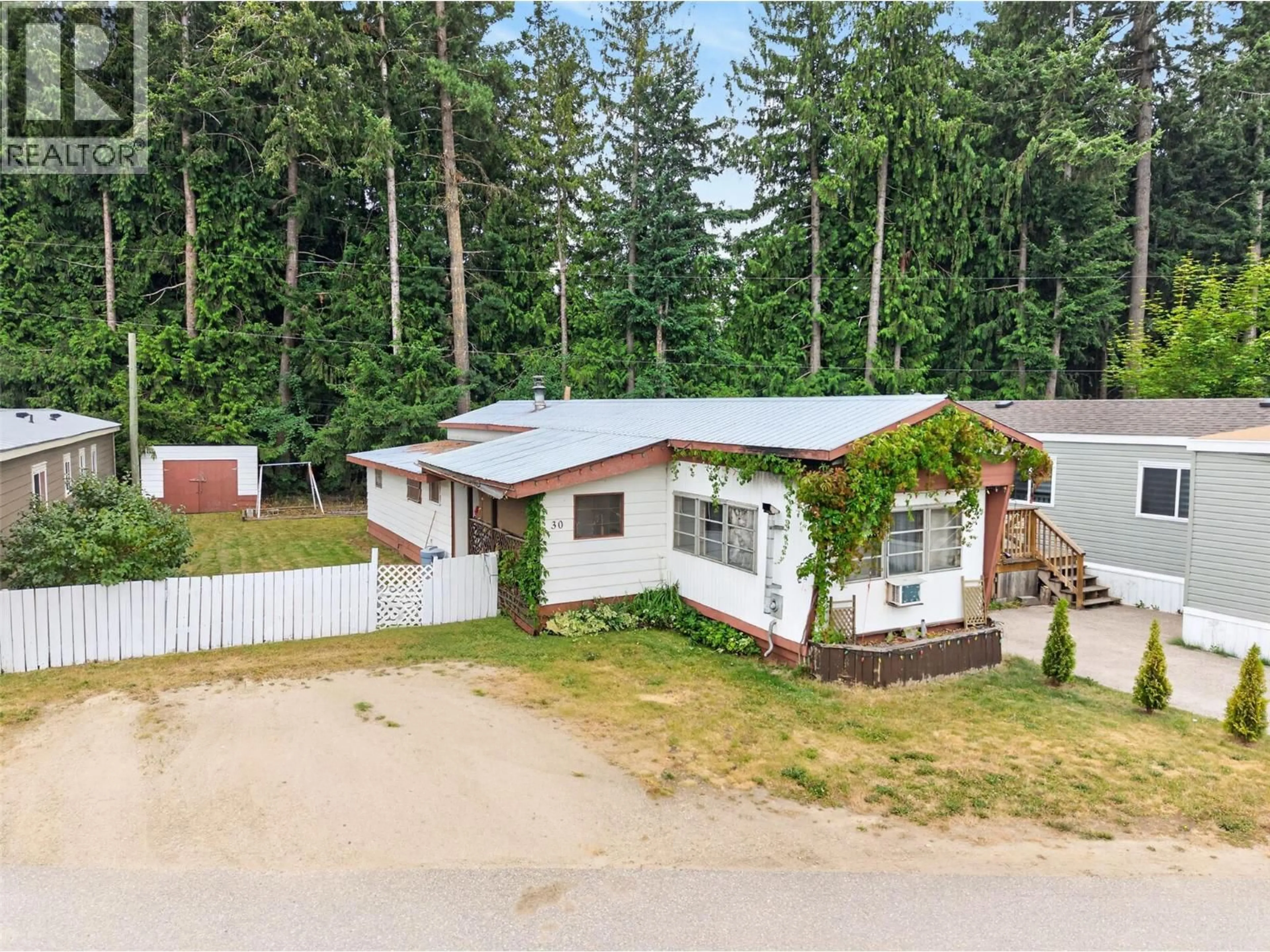 A pic from outside/outdoor area/front of a property/back of a property/a pic from drone, unknown for 30 - 501 KAPPEL STREET, Sicamous British Columbia V0E2V1