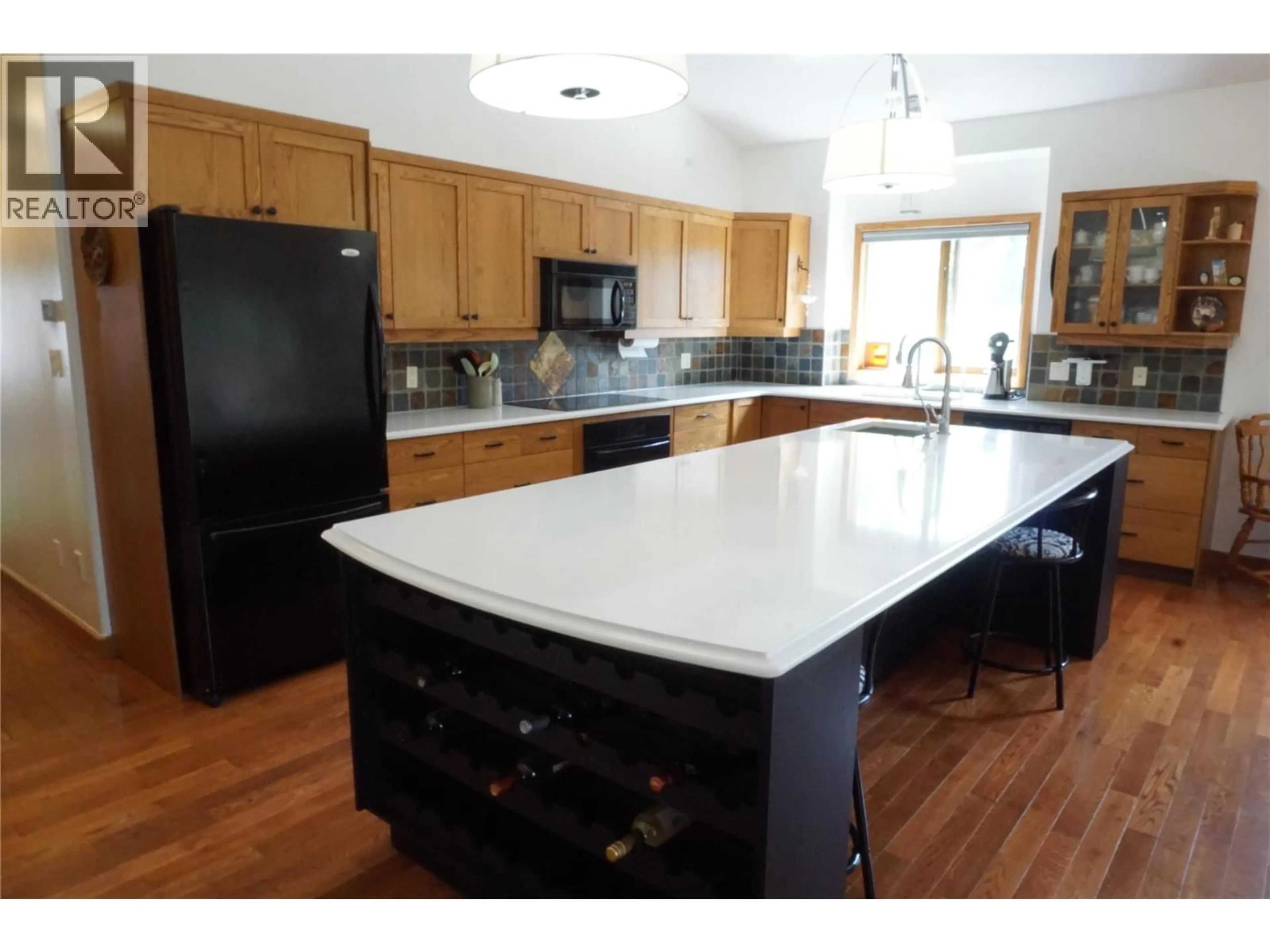 Open concept kitchen, unknown for 4951 HOT SPRINGS ROAD, Fairmont Hot Springs British Columbia V0B1L1