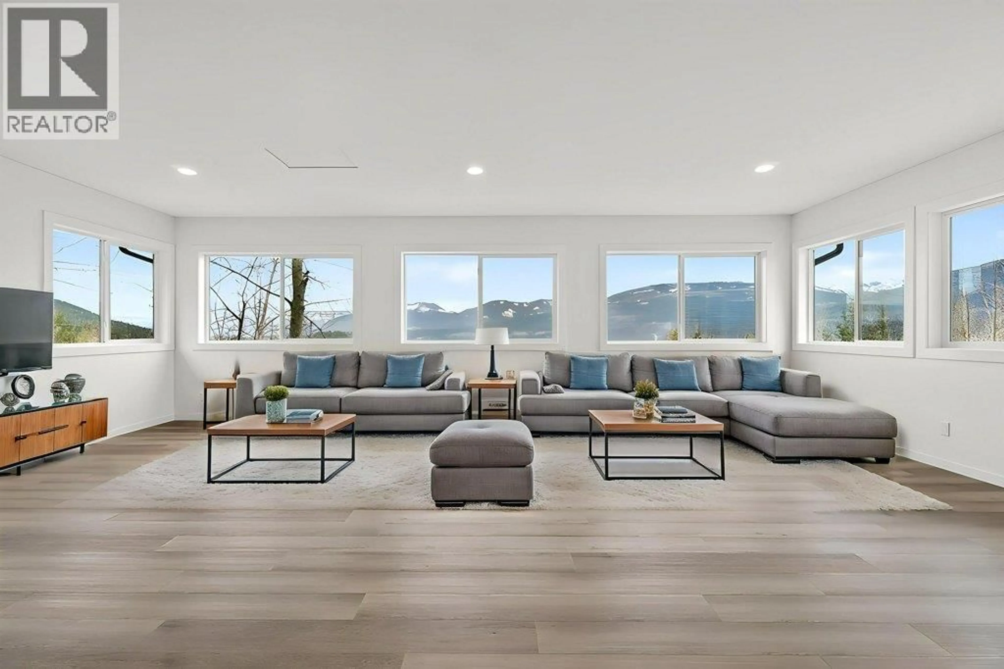 Living room with furniture, wood/laminate floor for 5058 HERITAGE DRIVE, Eagle Bay British Columbia V0E1T0