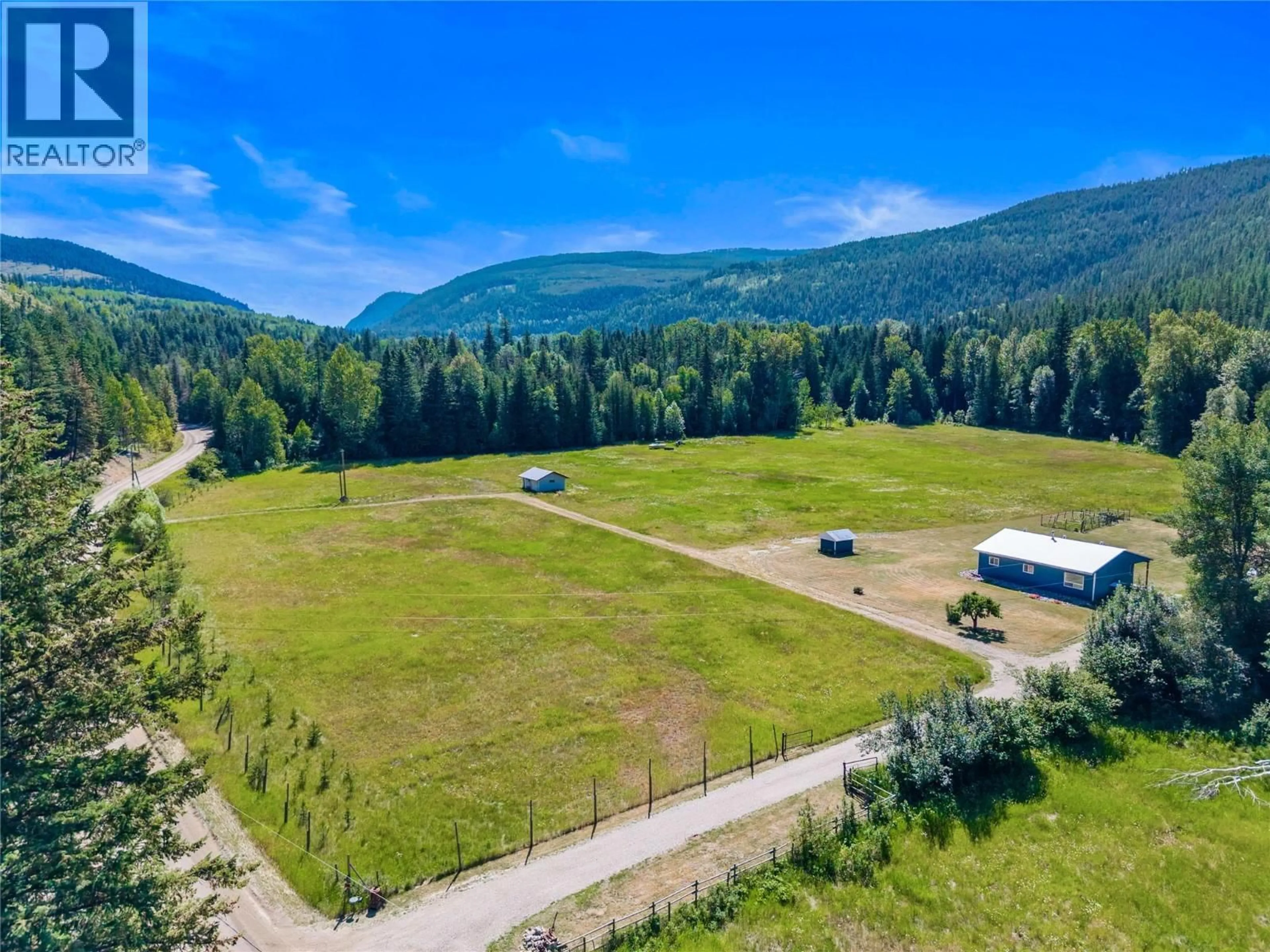 A pic from outside/outdoor area/front of a property/back of a property/a pic from drone, mountain view for 1370 CREIGHTON VALLEY ROAD, Lumby British Columbia V0E2G1