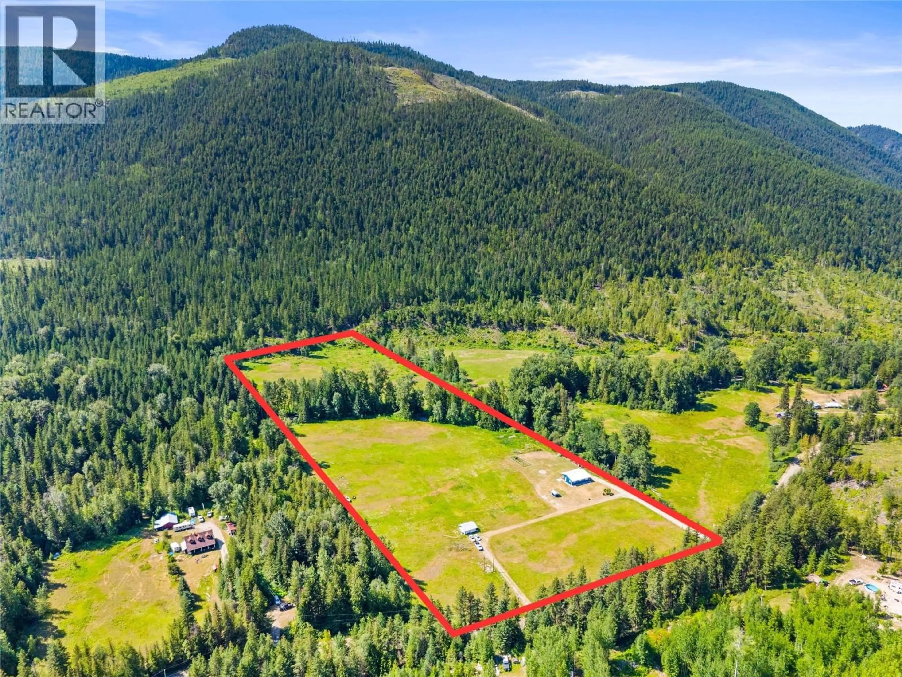 A pic from outside/outdoor area/front of a property/back of a property/a pic from drone, mountain view for 1370 CREIGHTON VALLEY ROAD, Lumby British Columbia V0E2G1
