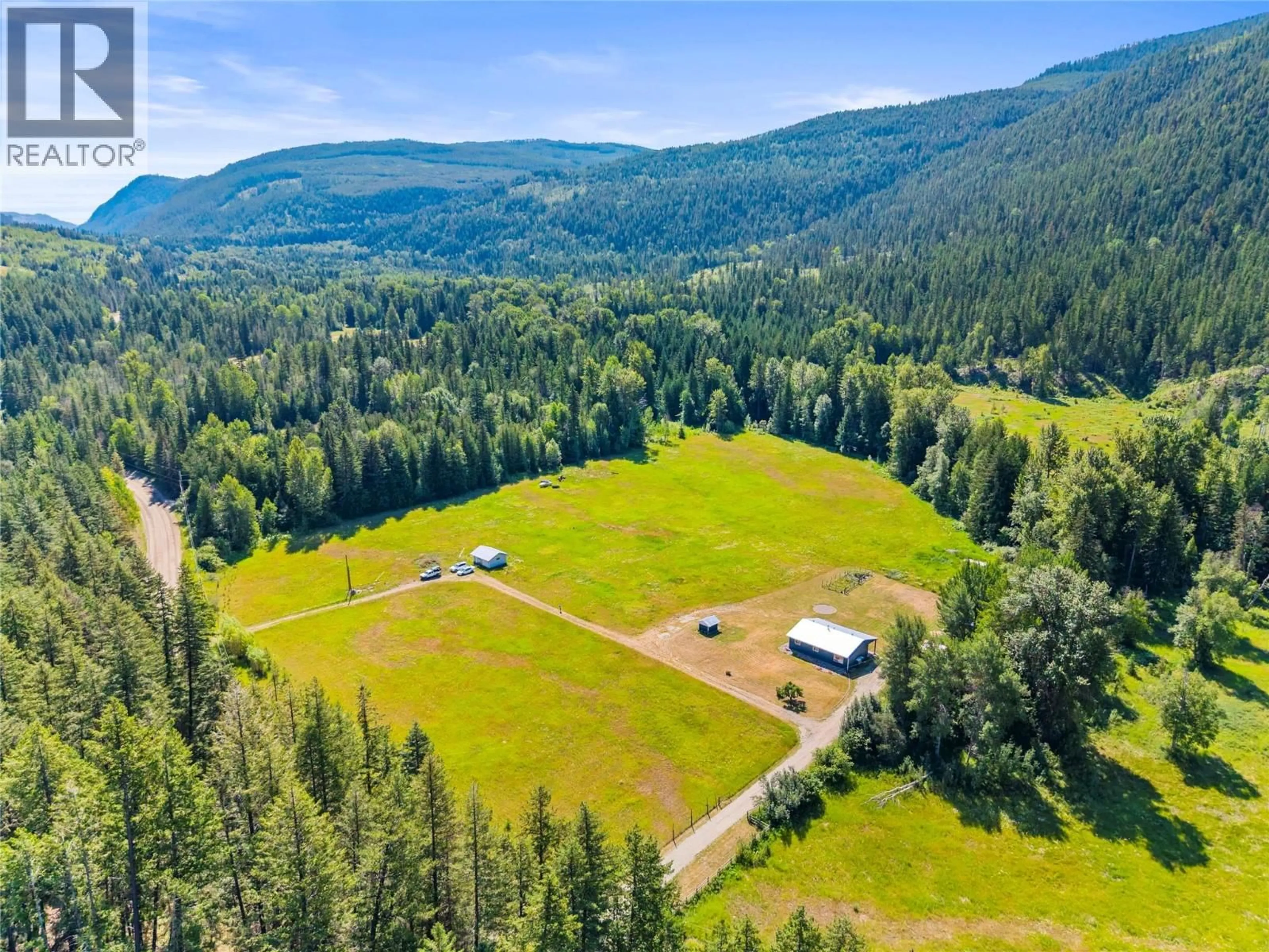 A pic from outside/outdoor area/front of a property/back of a property/a pic from drone, mountain view for 1370 CREIGHTON VALLEY ROAD, Lumby British Columbia V0E2G1