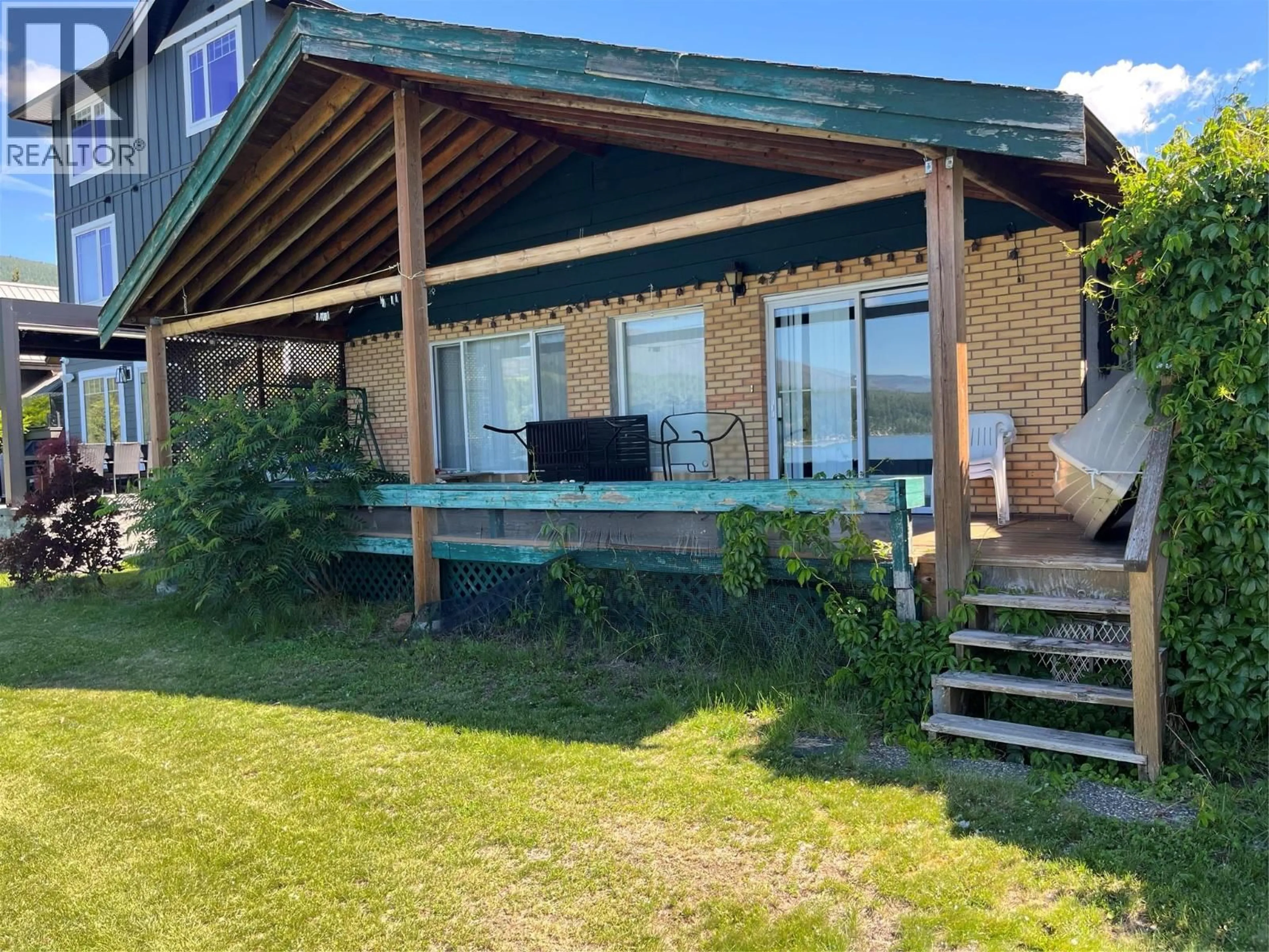 A pic from outside/outdoor area/front of a property/back of a property/a pic from drone, water/lake/river/ocean view for 2 - 6868 SQUILAX ANGLEMONT ROAD, Magna Bay British Columbia V0E1M7