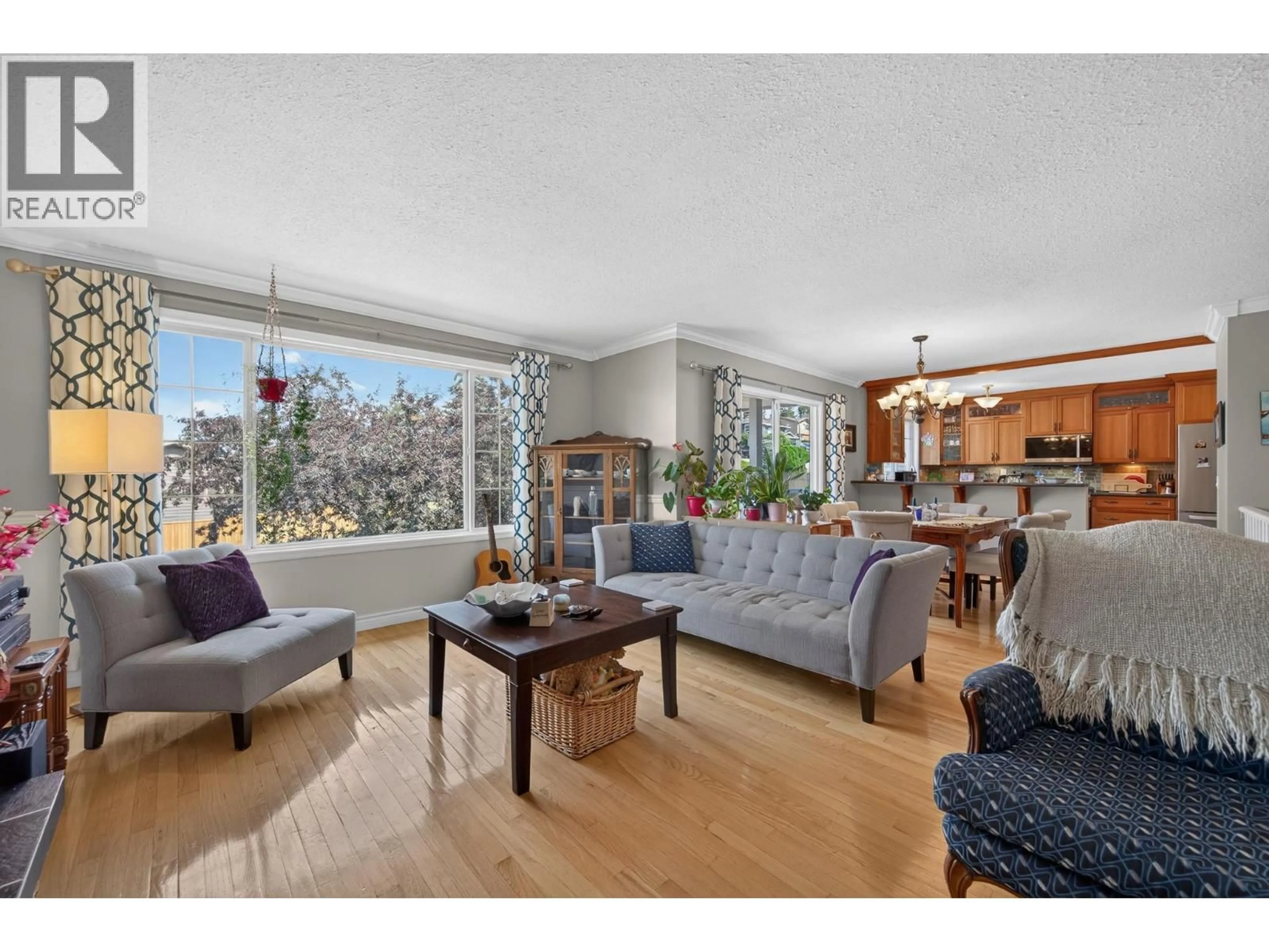 Living room with furniture, wood/laminate floor for 2094 VAN HORNE DRIVE, Kamloops British Columbia V1S1G2