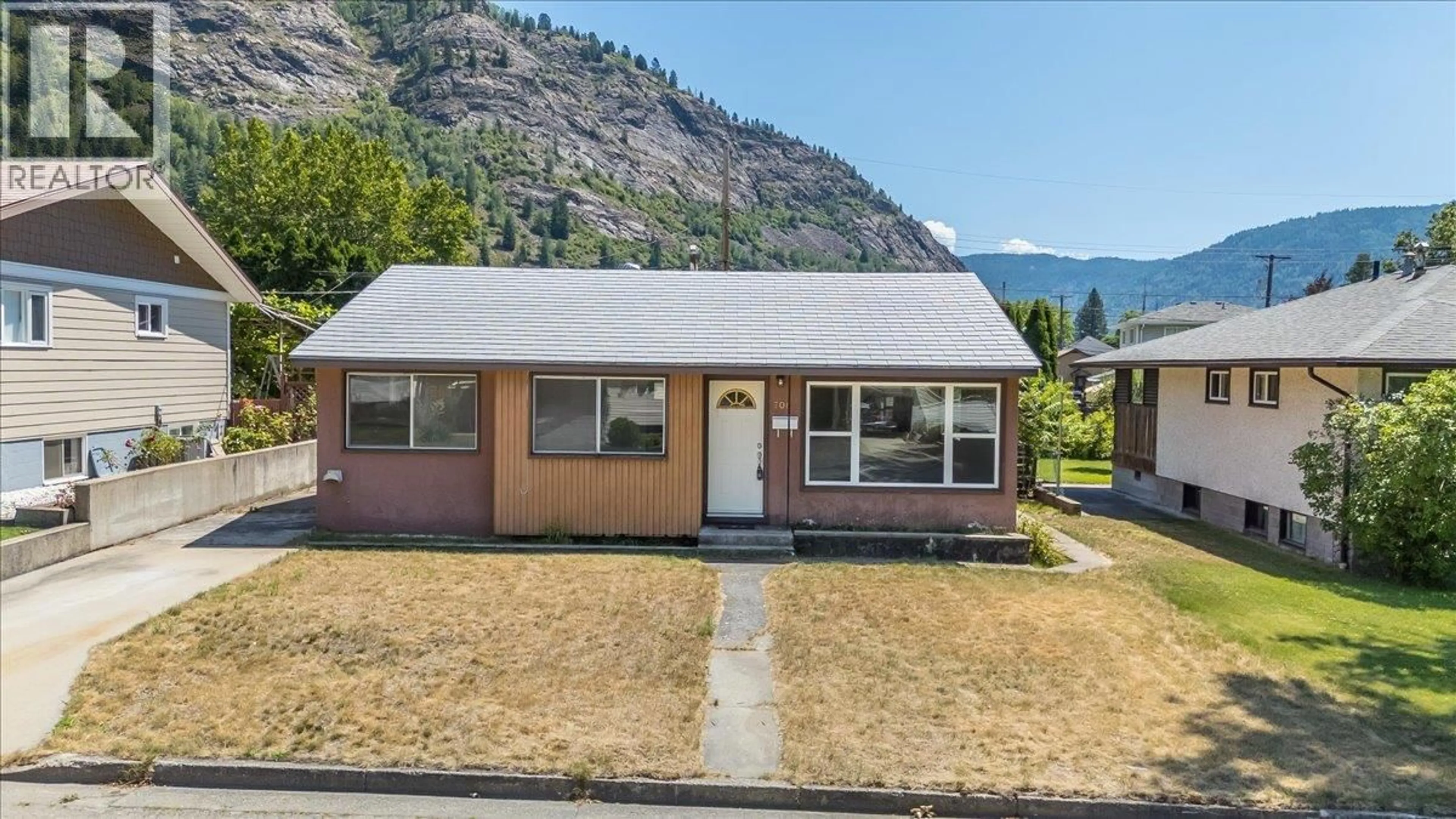 Home with vinyl exterior material, mountain view for 706 HERMIA CRESCENT, Trail British Columbia V1R1B4
