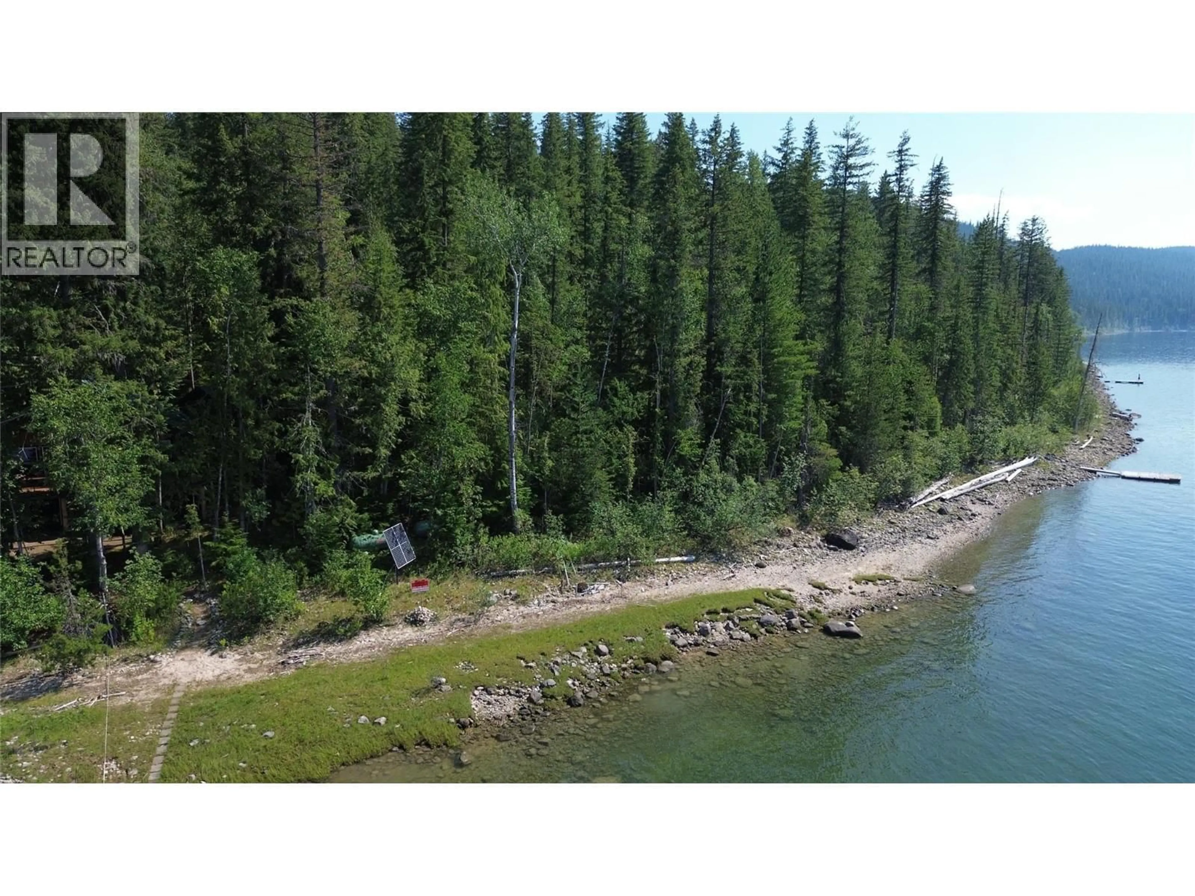 A pic from outside/outdoor area/front of a property/back of a property/a pic from drone, water/lake/river/ocean view for 660 BRADLEY ROAD OTHER, Seymour Arm British Columbia