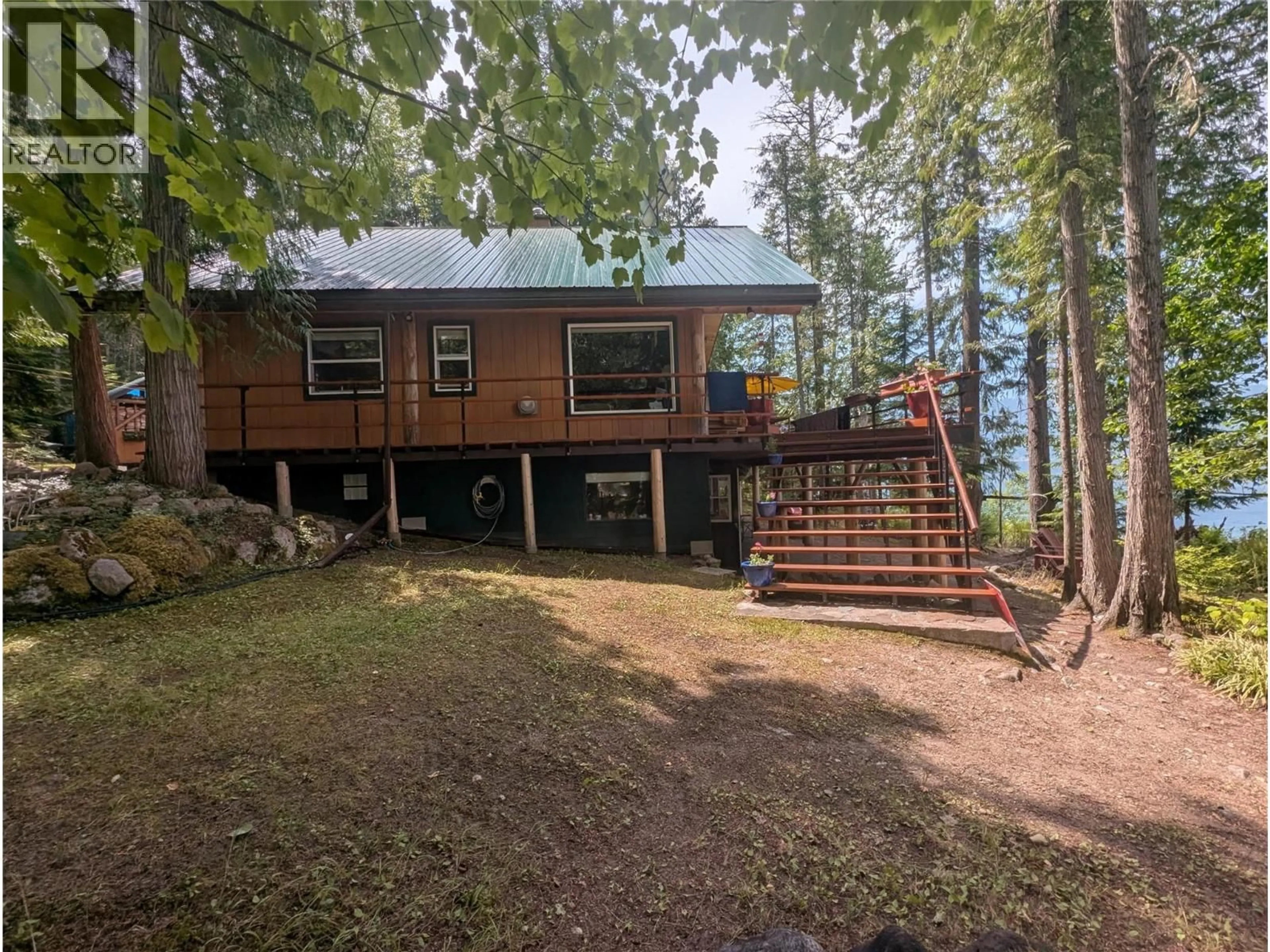 A pic from outside/outdoor area/front of a property/back of a property/a pic from drone, unknown for 660 BRADLEY ROAD OTHER, Seymour Arm British Columbia