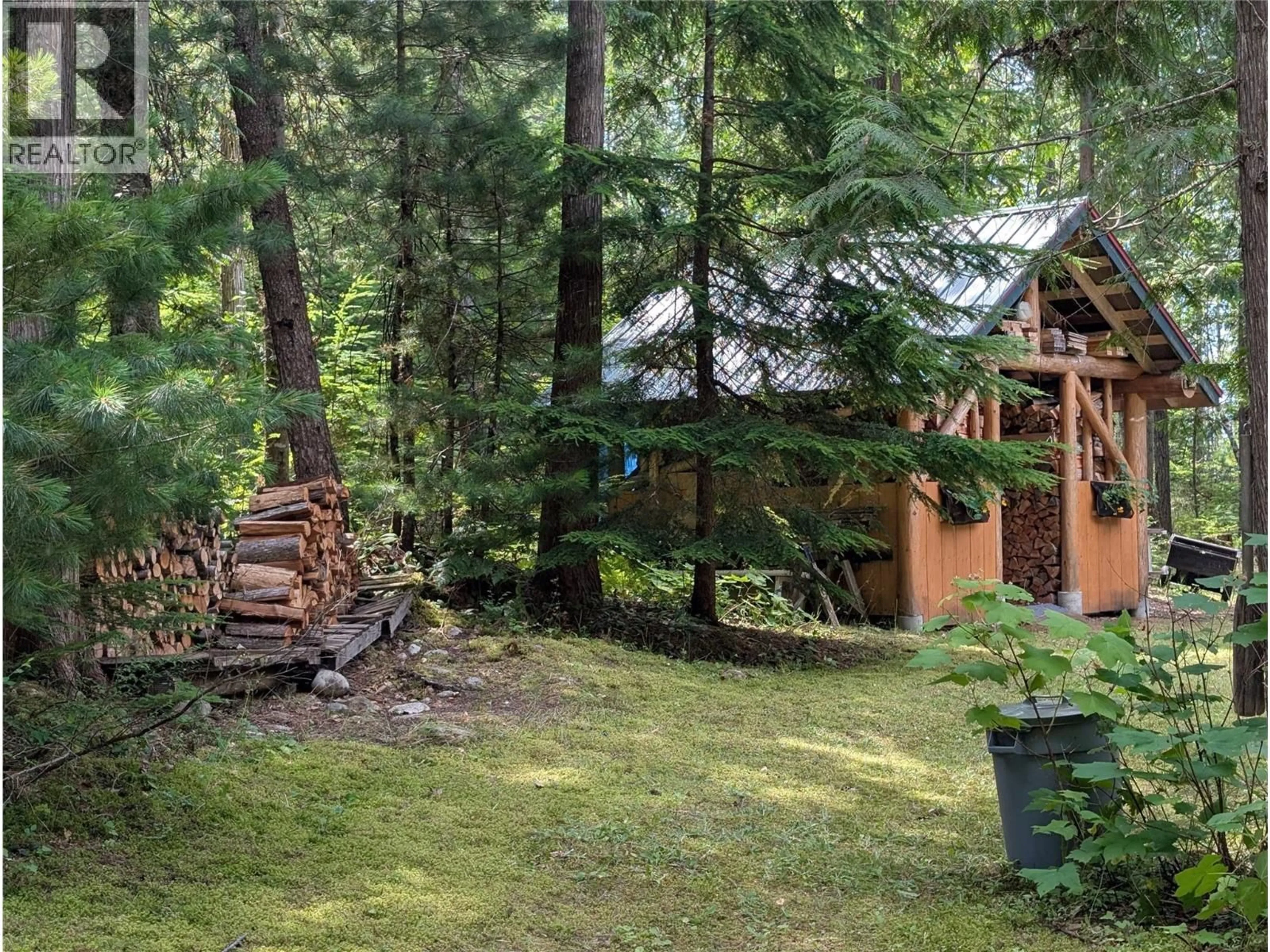 A pic from outside/outdoor area/front of a property/back of a property/a pic from drone, forest/trees view for 660 BRADLEY ROAD OTHER, Seymour Arm British Columbia